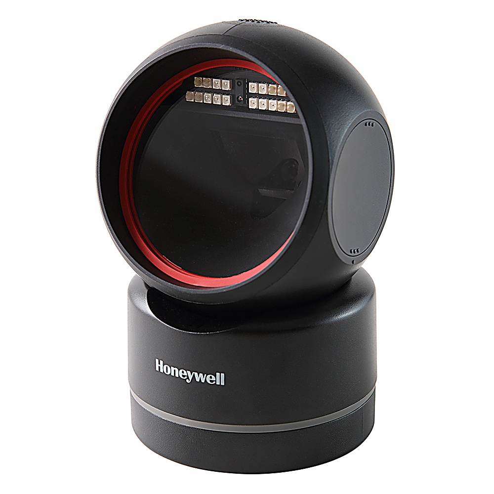 Uno scanner Honeywell nero. Ha una testa rotonda con un anello rosso e luci rettangolari. La base è cilindrica.