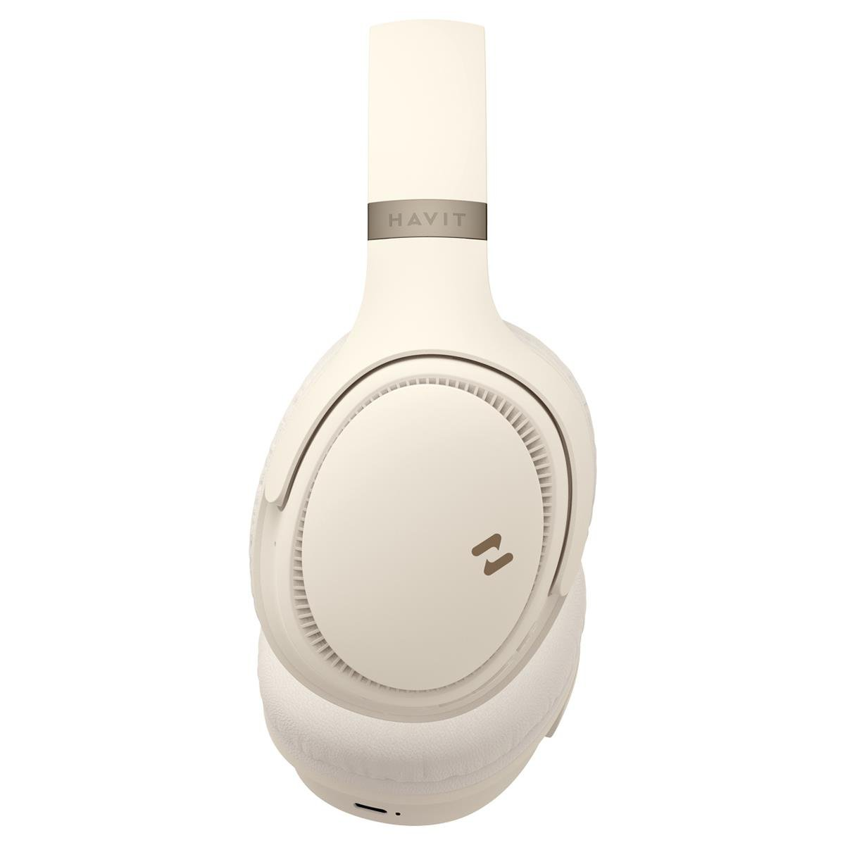 Kremowe słuchawki nauszne HAVIT. Opaska ma szary pasek z nazwą marki. Muszle mają logo.