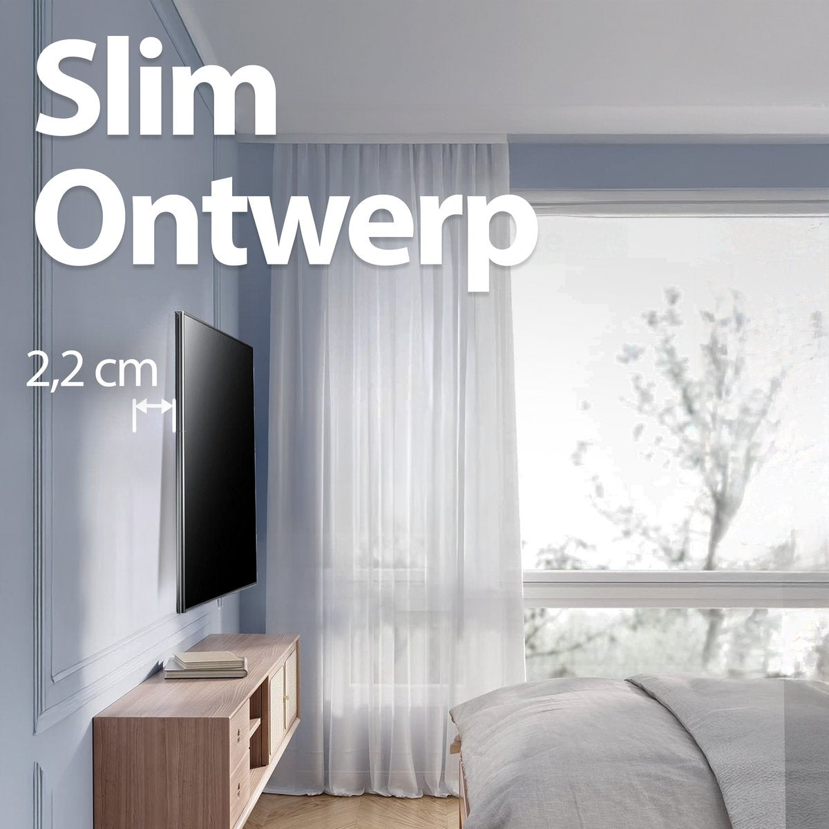 A slim TV mounted on a blue wall. A wooden cabinet is below it. A window with curtains and a bed are in the background.
