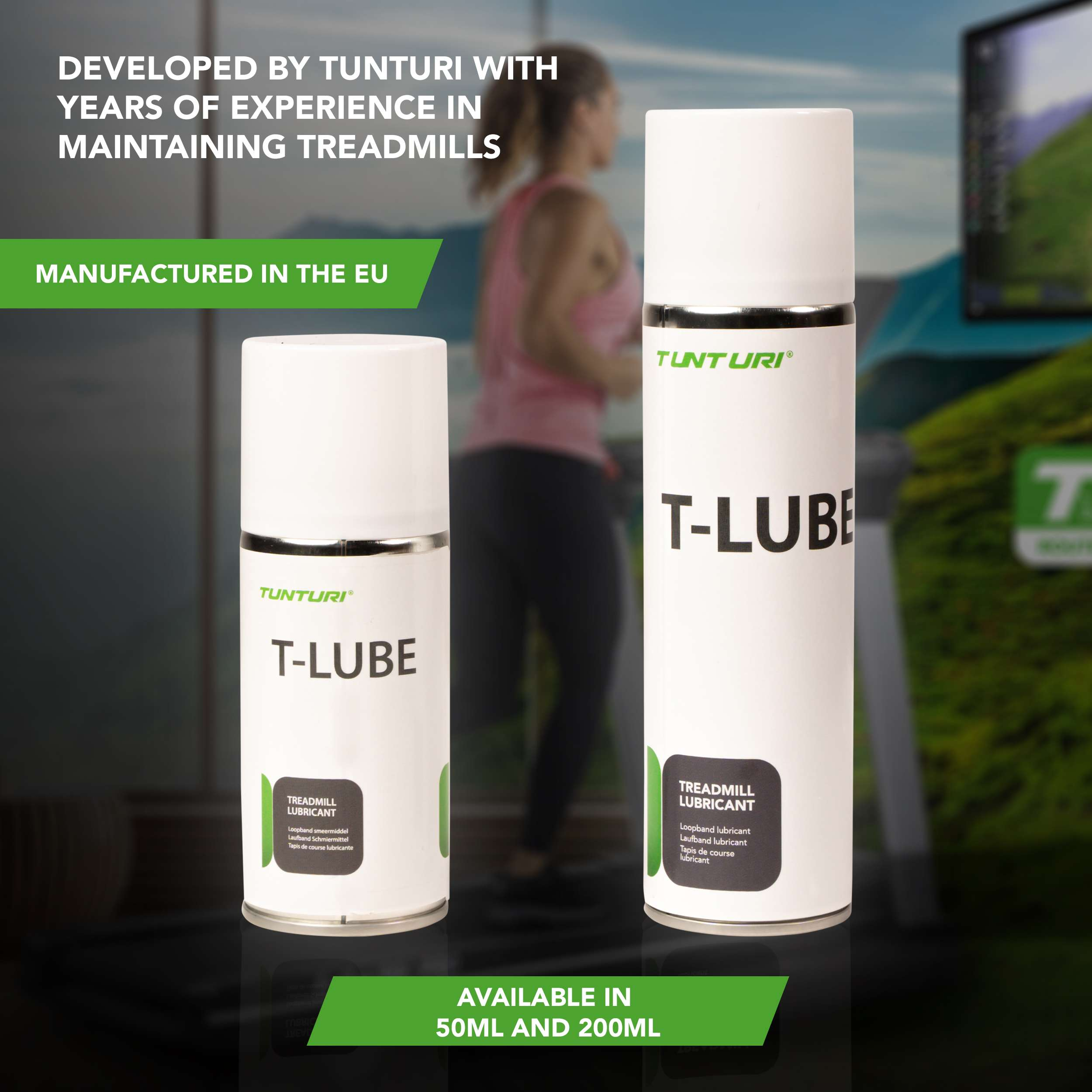 Twee T-LUBE flessen. Een vrouw is wazig op de achtergrond. Tekst bevat 'Developed by Tunturi' en 'Manufactured in the EU'.