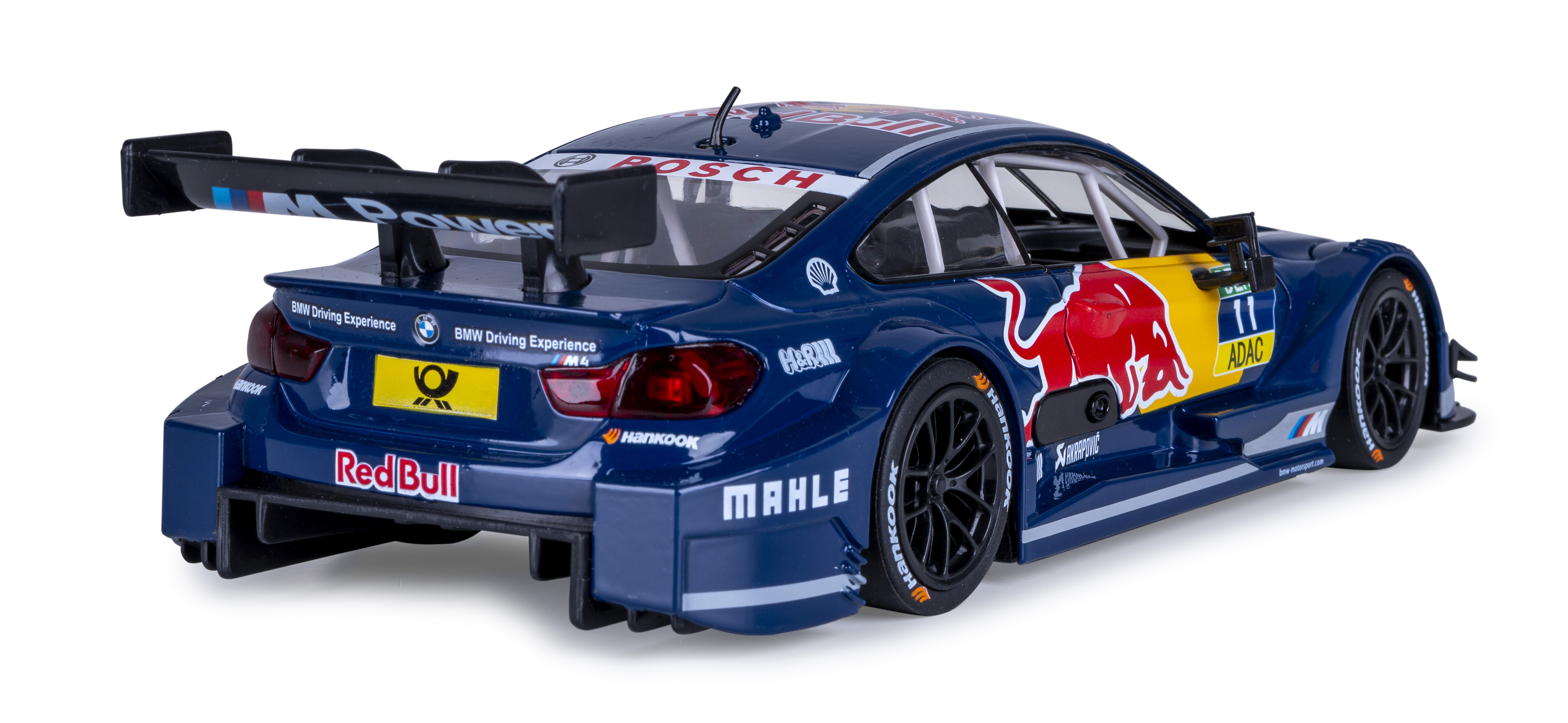Ein blau-gelbes Red Bull-Rennauto steht auf einer weißen Oberfläche. Das Auto hat Sponsorenlogos und einen großen Heckflügel.