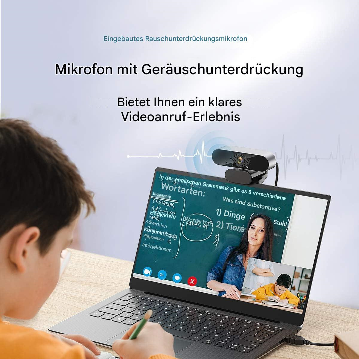 Ein Junge benutzt einen Laptop mit einer Webcam. Der Bildschirm zeigt eine Lehrerin und einen Schüler. Text auf Deutsch ist sichtbar.