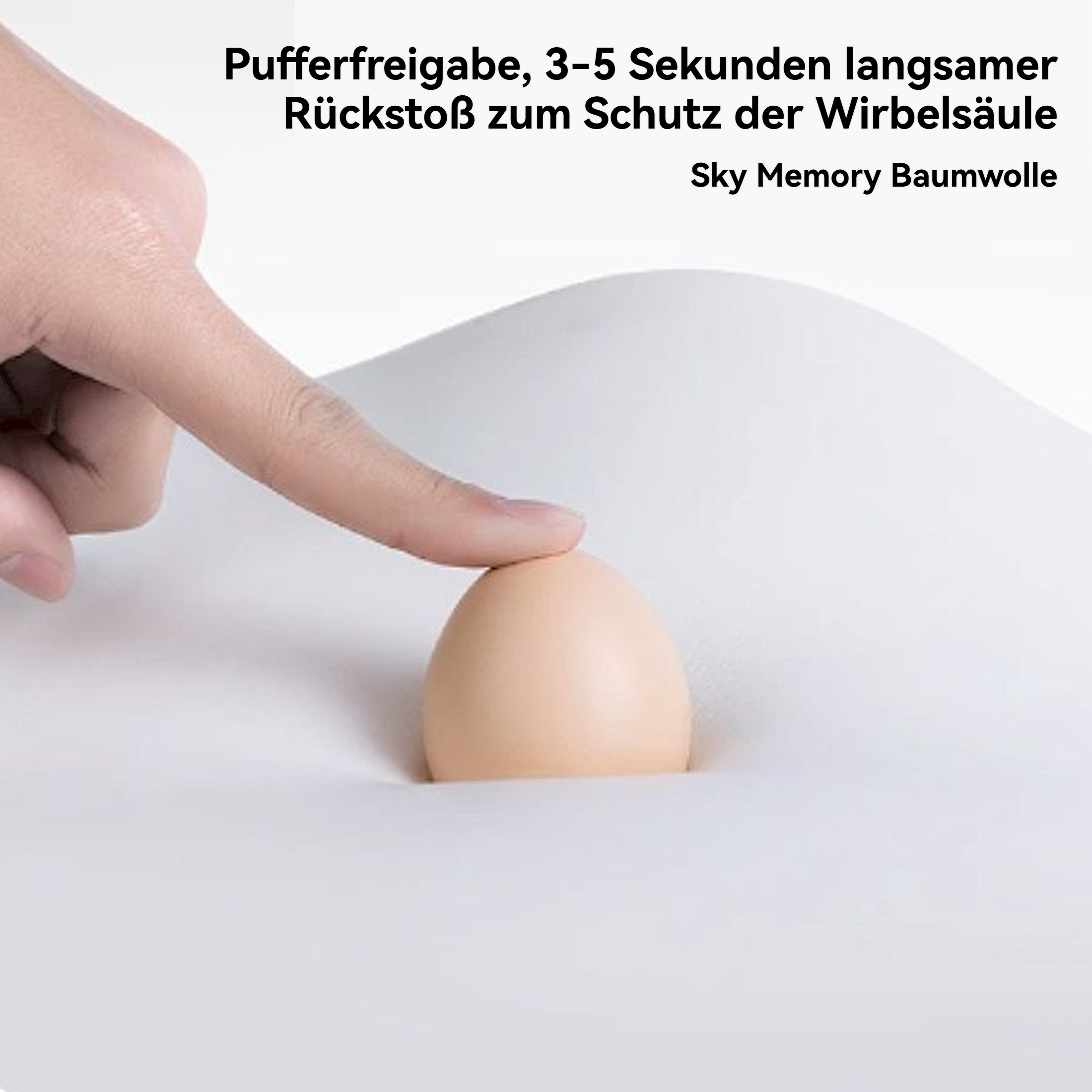 Ein Finger drückt auf ein beige eiförmiges Objekt, eingebettet in eine weiche, weiße Oberfläche. Text auf Deutsch.
