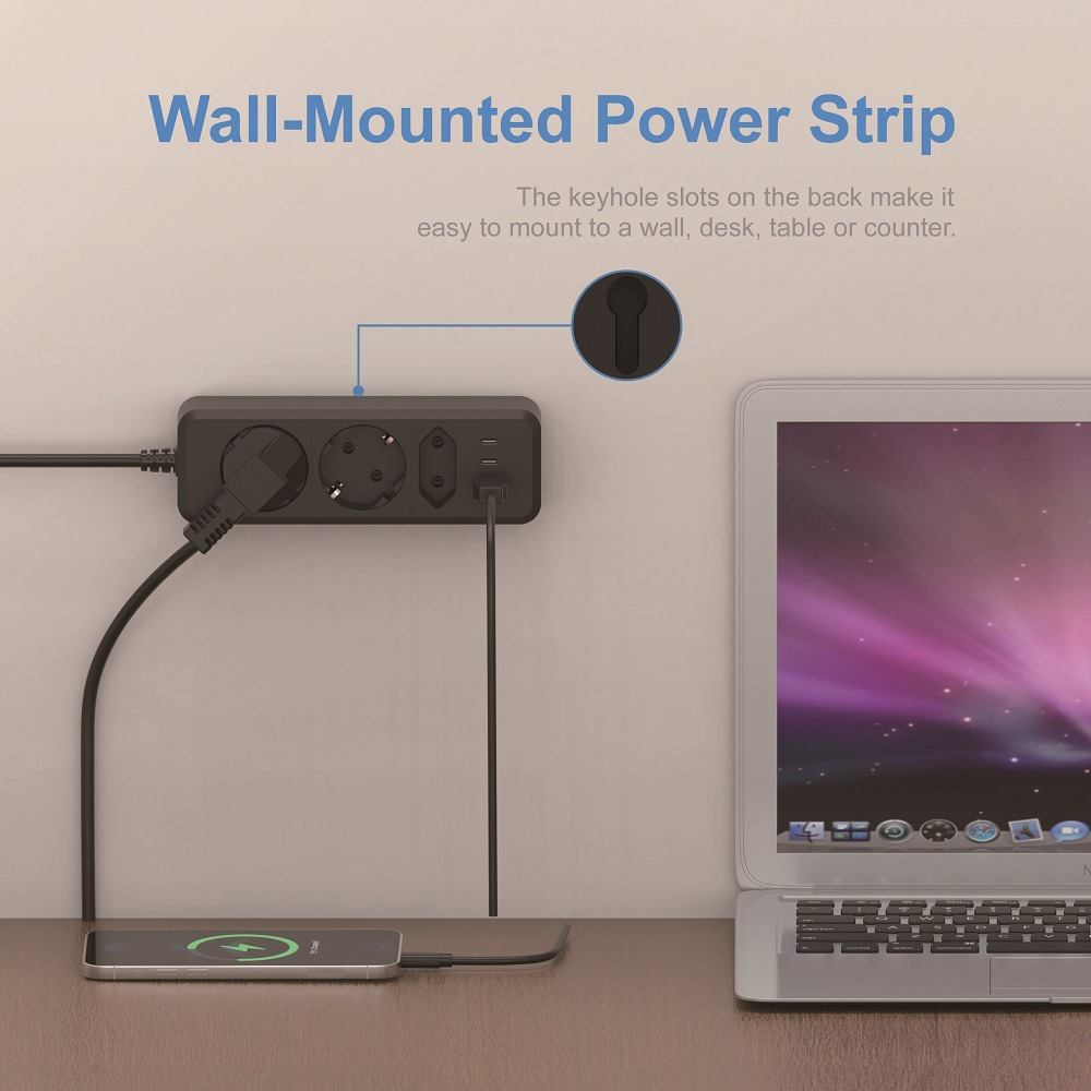 Eine Wandsteckdosenleiste mit Steckdosen und USB-Anschlüssen. Auf dem Schreibtisch befinden sich ein Laptop und ein ladendes Telefon. Die Leiste ist mit der Wand verbunden.