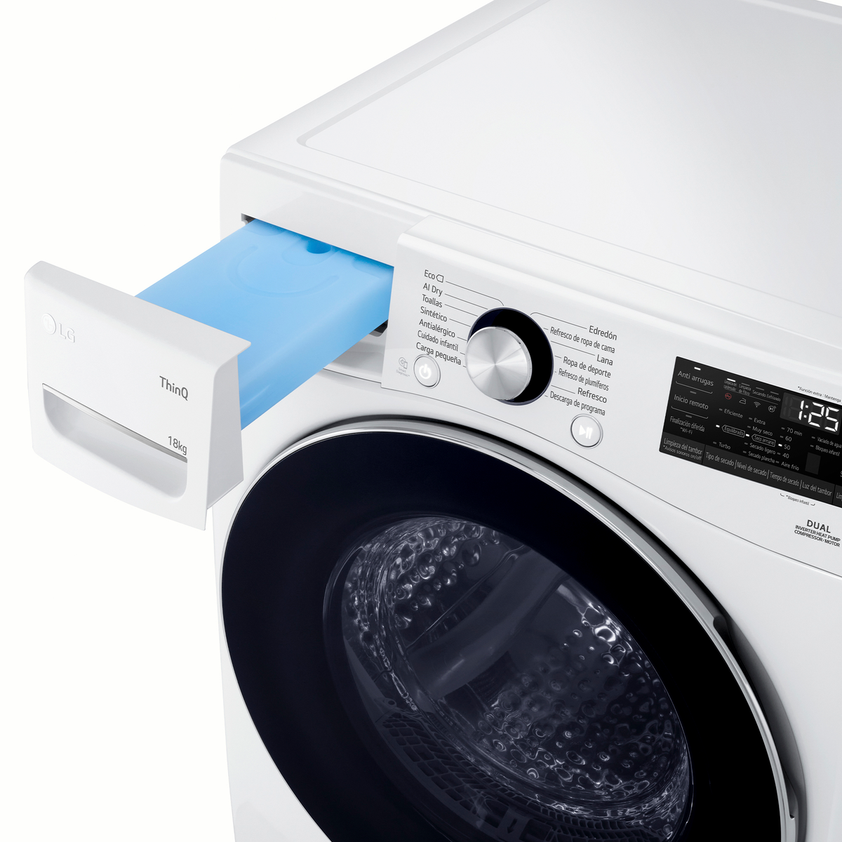 A white LG washing machine is displayed. The detergent drawer is open, revealing a blue container. The control panel is visible.