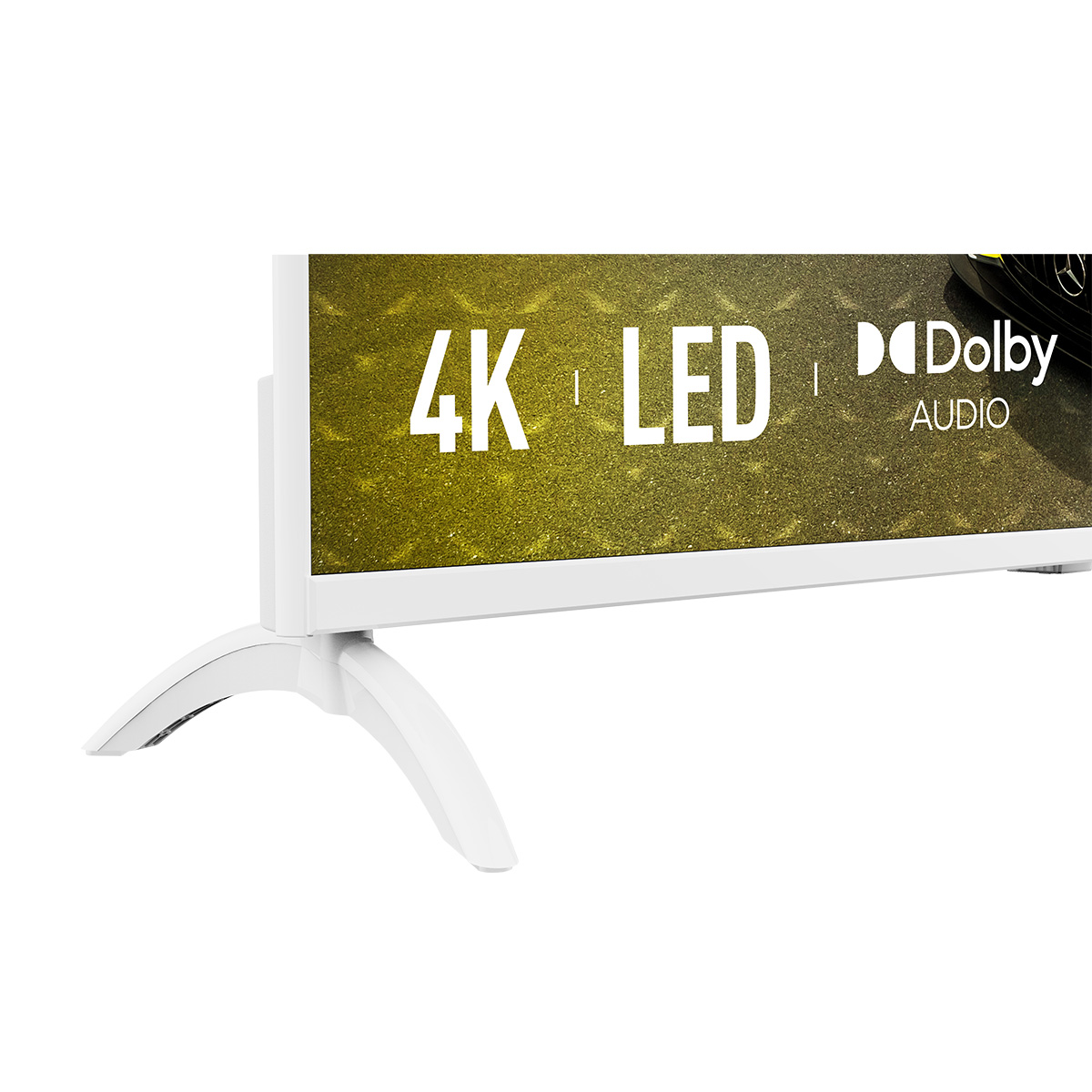 Biały telewizor z zakrzywionymi nóżkami. Ekran wyświetla 4K LED i Dolby Audio. Tło ma żółto-zielony wzór.