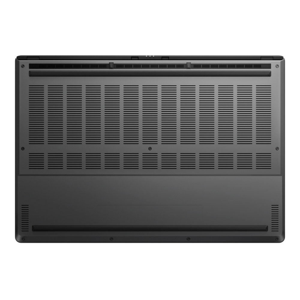Vista inferiore di un laptop grigio scuro. Presenta griglie di ventilazione, viti e una superficie liscia e piatta.