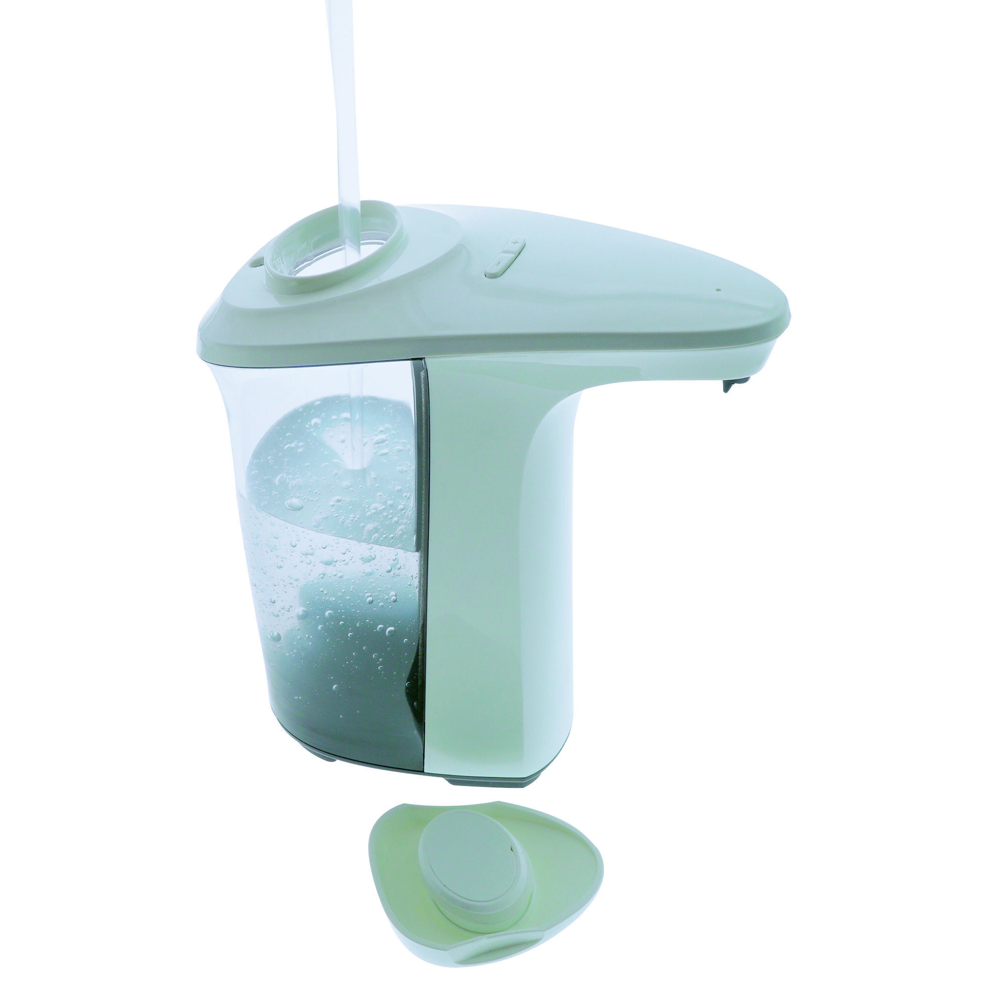 Un dispensador de jabón líquido blanco con un recipiente transparente lleno de líquido. Una tapa está debajo del dispensador.