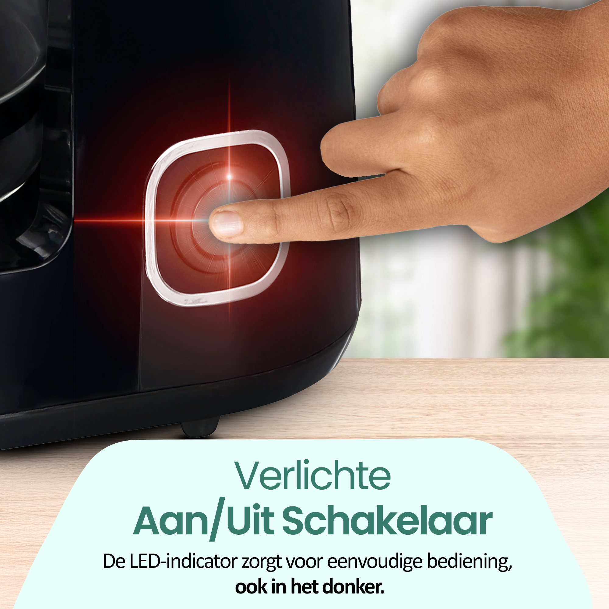 A finger presses a glowing red power button on a black appliance. Text below reads: Illuminated On/Off Switch.