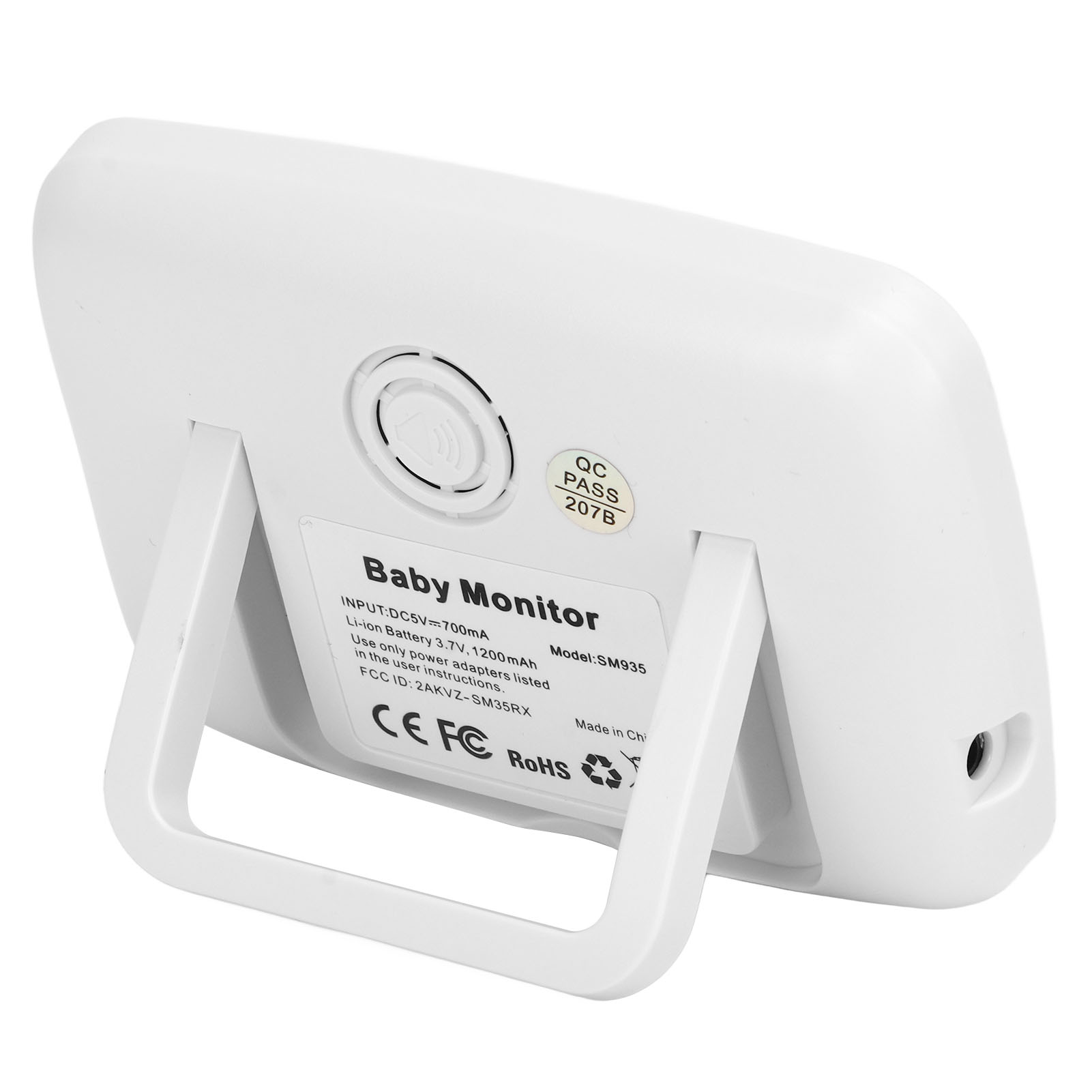 Ein weißer Babyphone mit Ständer. Es hat einen Lautsprecher und einen Aufkleber mit Spezifikationen. Der Markenname lautet 'Baby Monitor'.