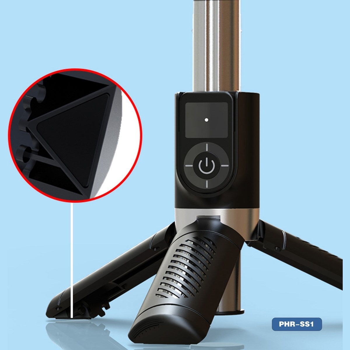 A black tripod with a power button, on a light blue background. A magnified view shows a black triangle.