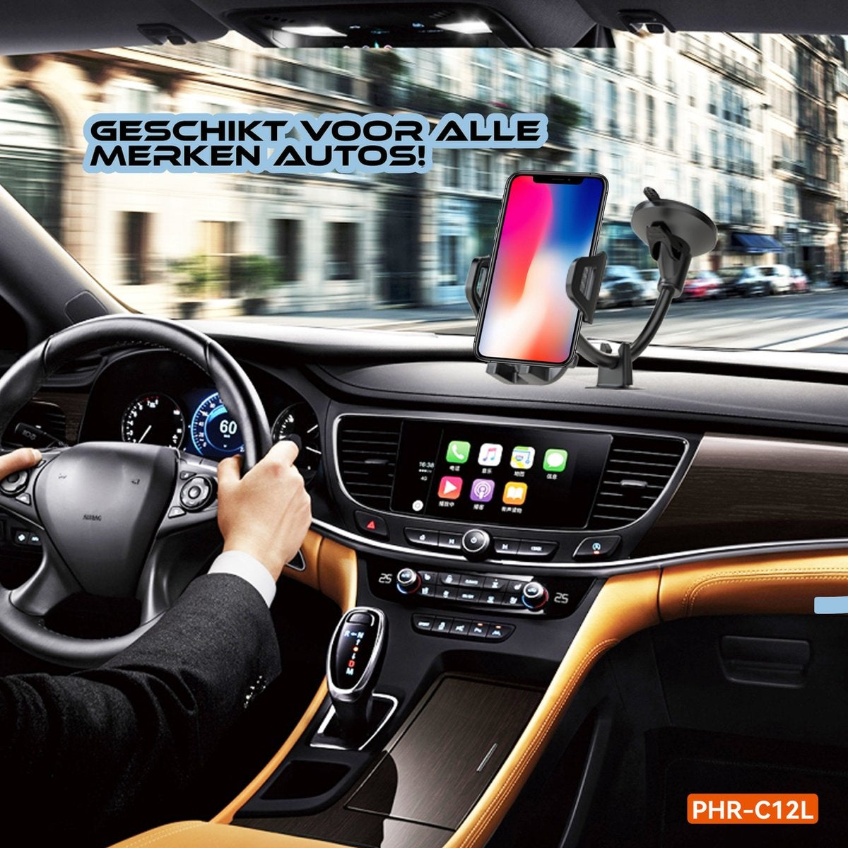 A phone is mounted on a car dashboard. A person is holding the steering wheel. The car is driving on a city road.