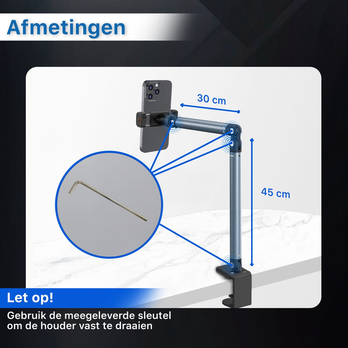 Een telefoon gemonteerd op een verstelbare arm. Afmetingen: 30 cm armlengte, 45 cm hoogte. Inclusief een sleutel. Tekst: Gebruik de meegeleverde sleutel om vast te draaien.