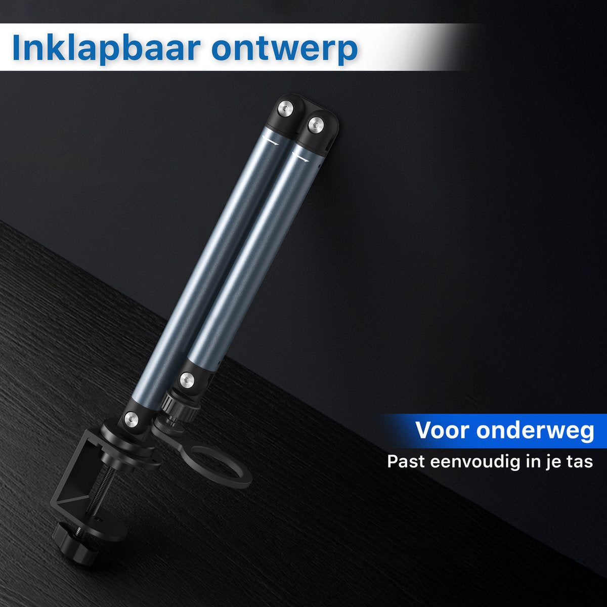 Een opvouwbaar zilveren statief op een zwart oppervlak. Tekst: opvouwbaar ontwerp, voor onderweg, past gemakkelijk in je tas.