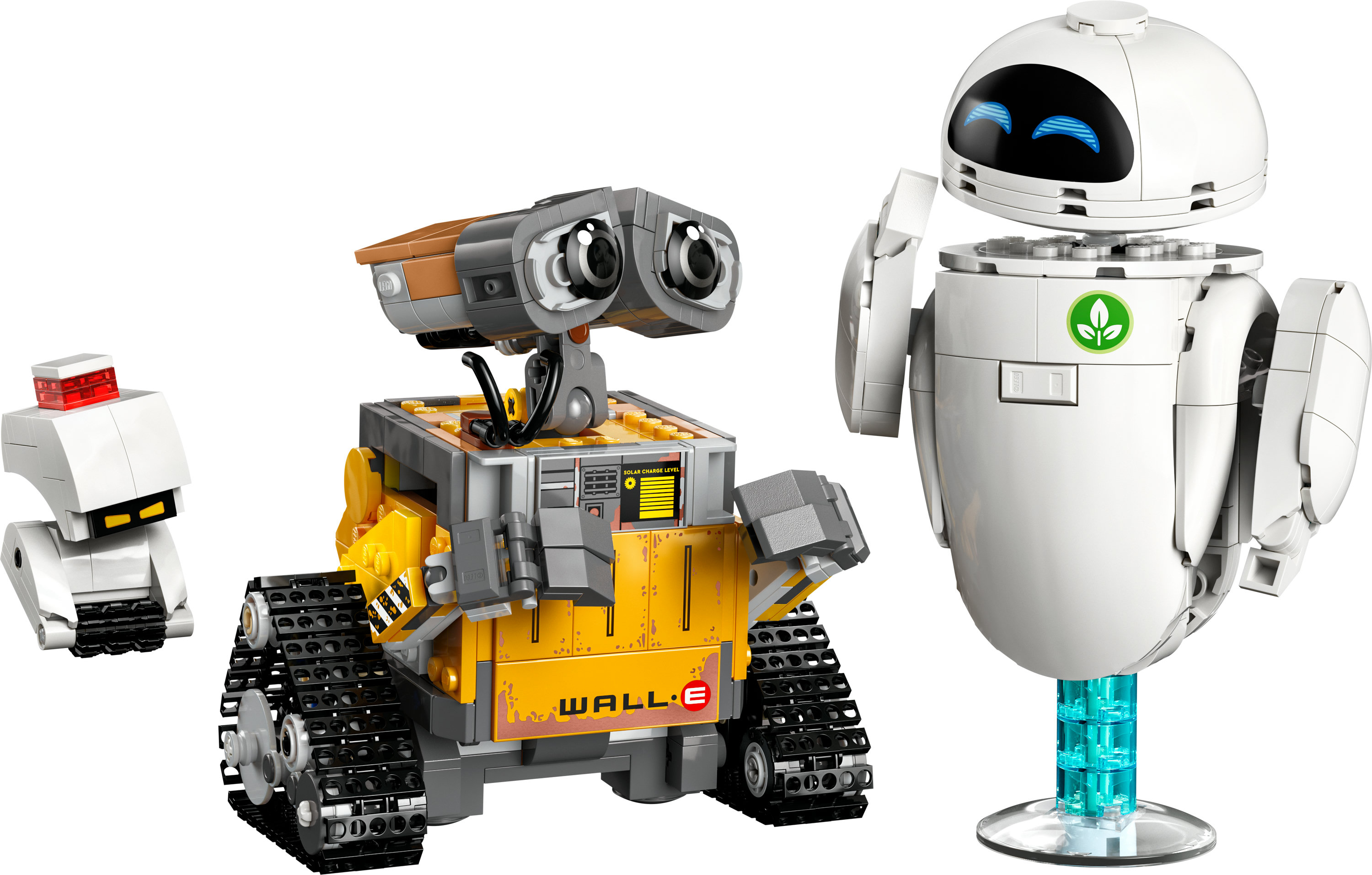 Zestaw Lego z trzema robotami: Wall-E, Eve i małym białym robotem z czerwoną górą. Wszystko na białym tle.