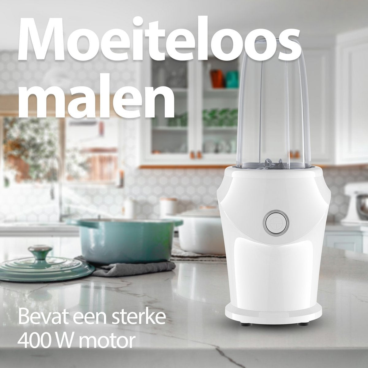 A white blender with a transparent container stands on a counter. Text reads 'Moeiteloos malen' and 'Bevat een sterke 400 W motor'.