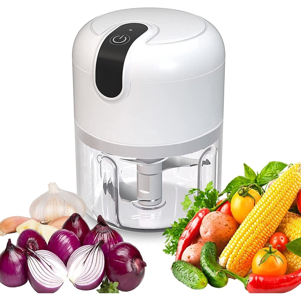 A white food processor with vegetables like onions, garlic, corn, tomatoes, and peppers arranged around it.