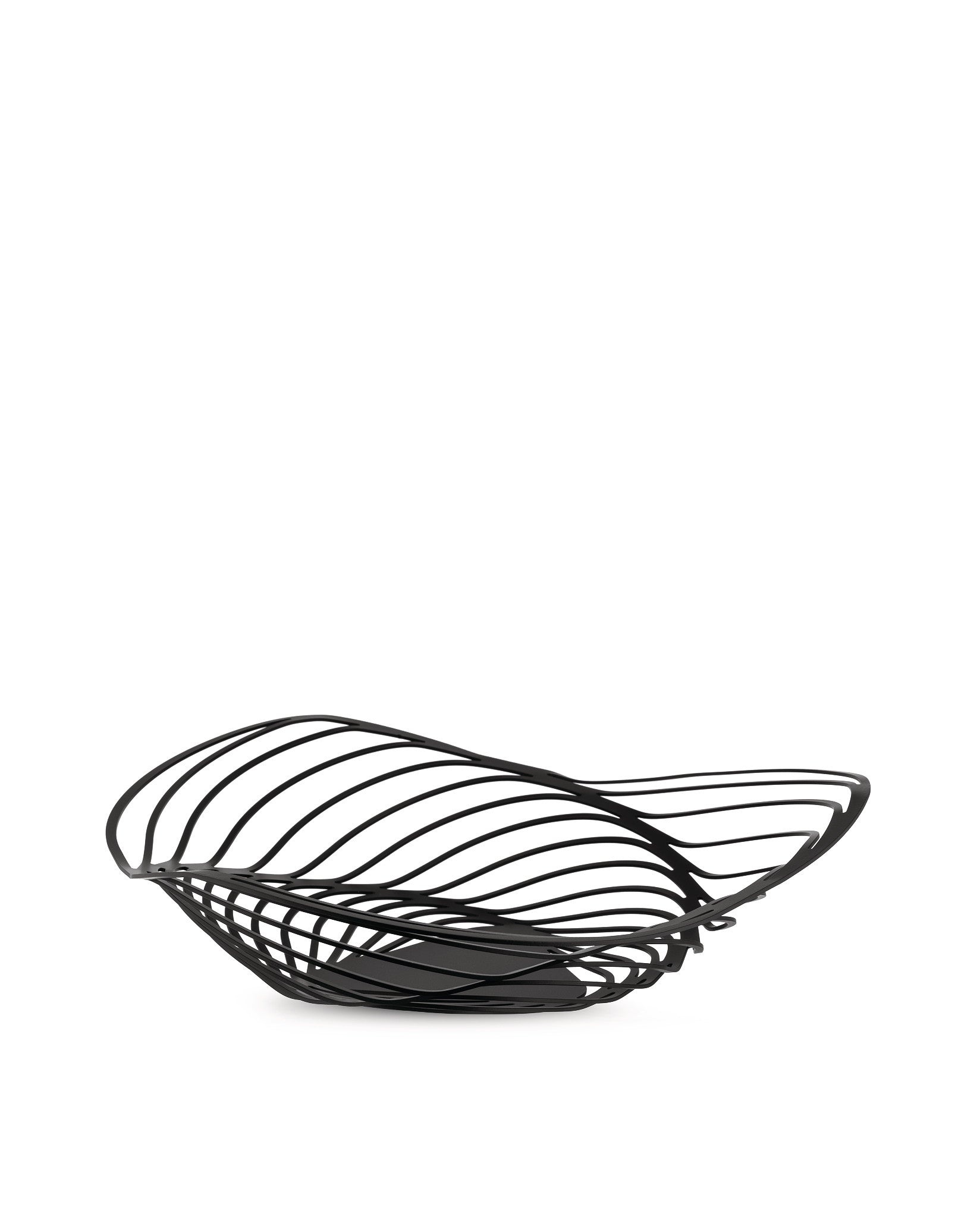 Una fruttiera in metallo nero a forma di onda su sfondo bianco.