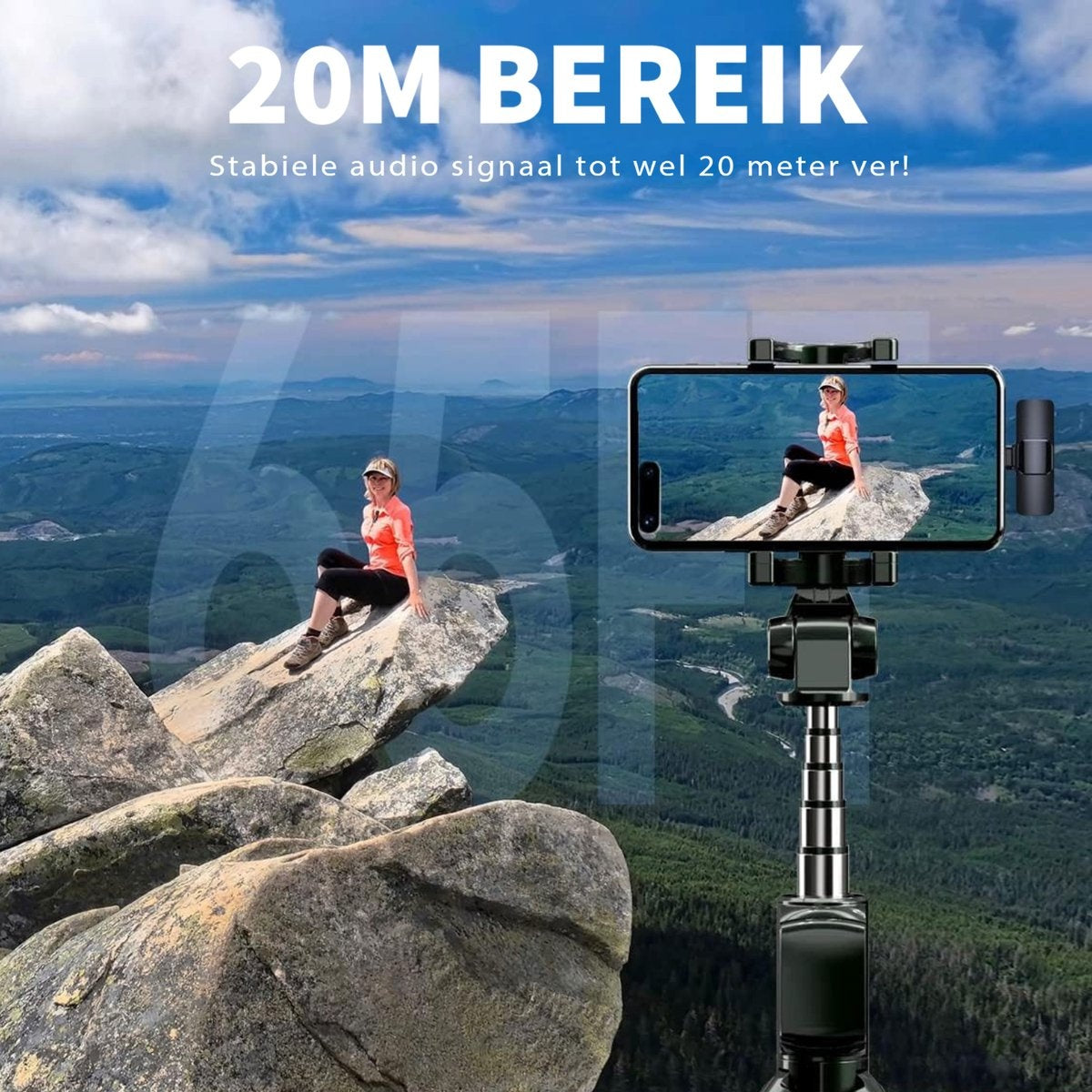 A woman sits on a rock, a phone on a selfie stick shows her. Mountains in the background. Text: 20M BEREIK.