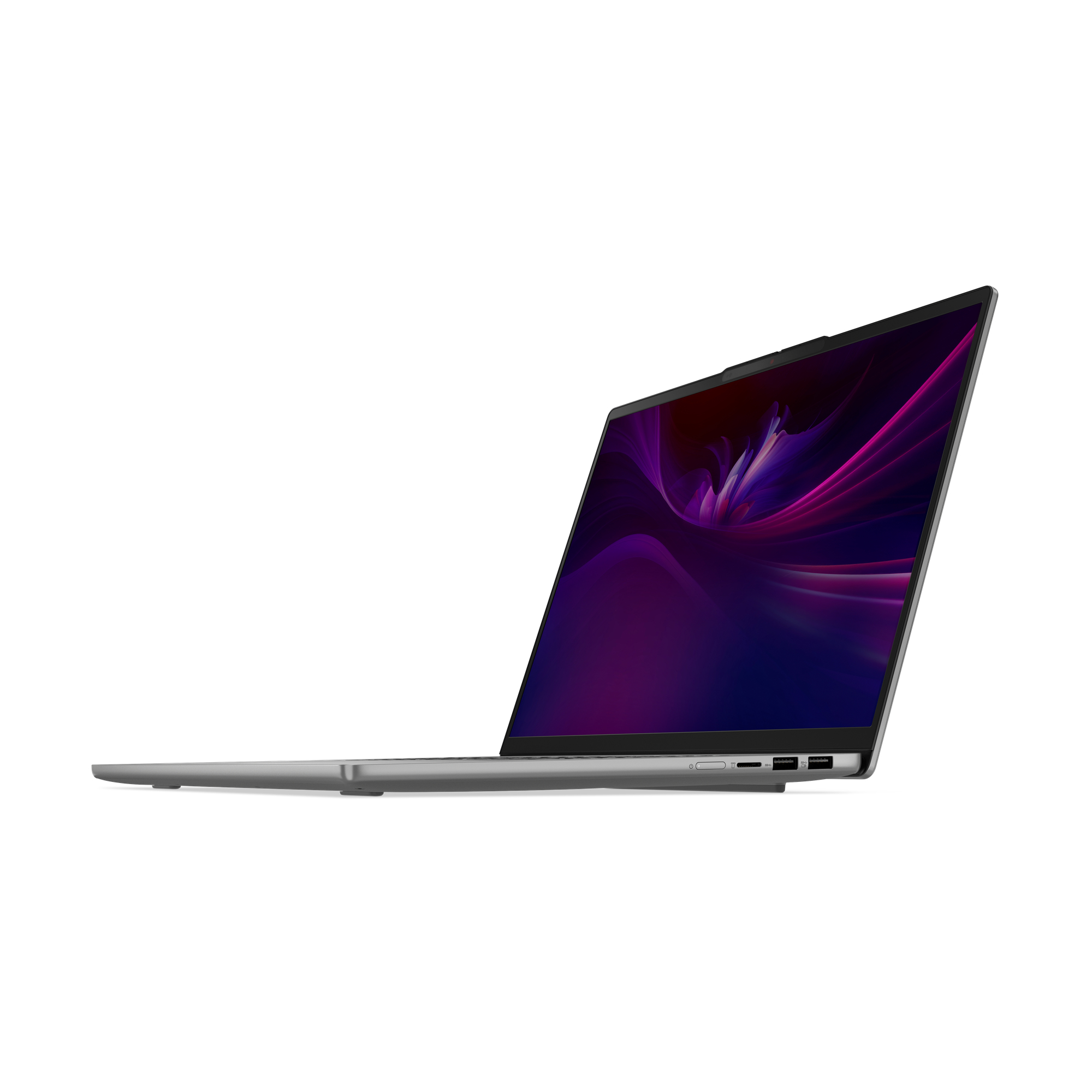Un laptop argentato è leggermente aperto su sfondo bianco. Lo schermo mostra un design astratto viola e rosa.