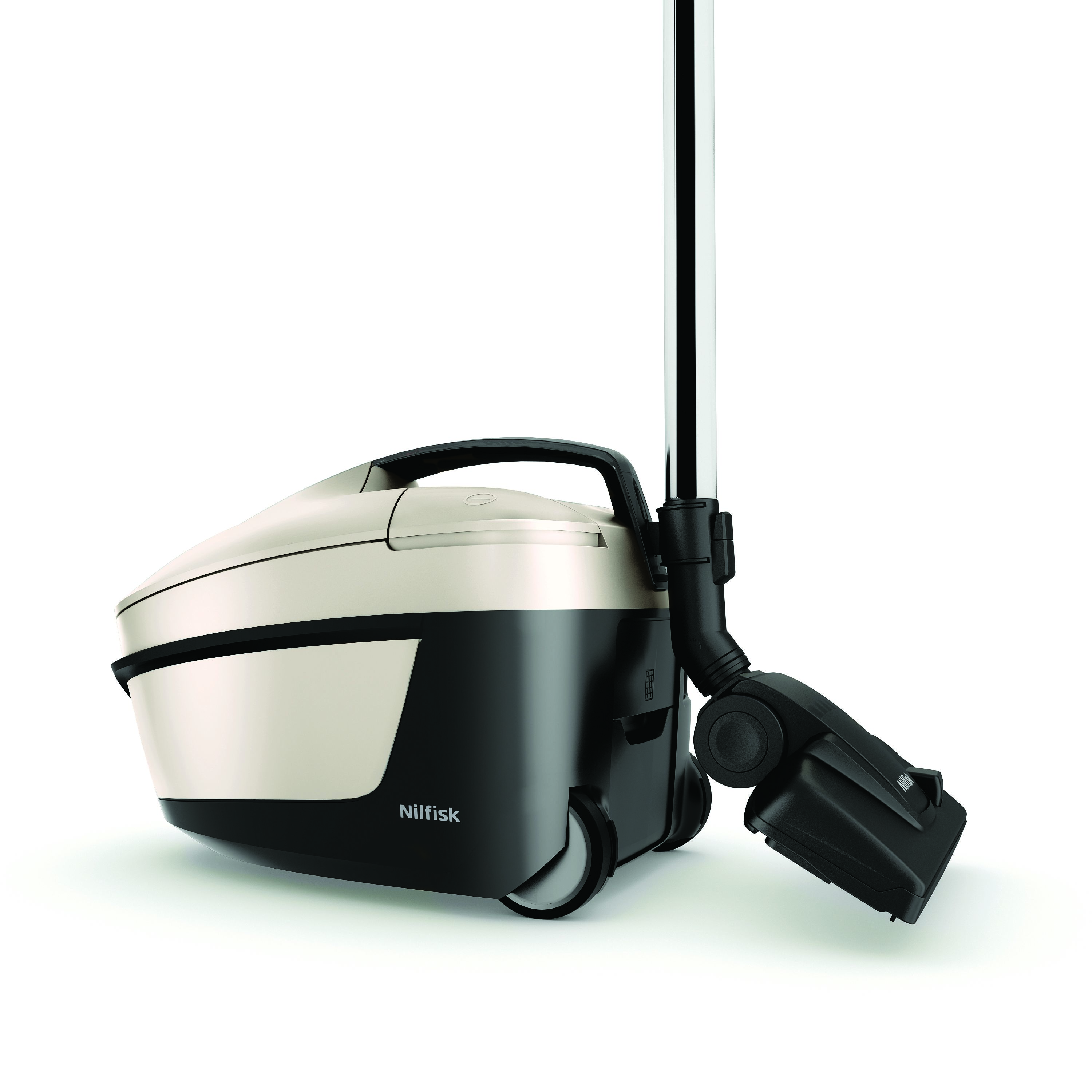 A cream and black Nilfisk vacuum cleaner stands on a white surface. It has a long handle and a cleaning head.