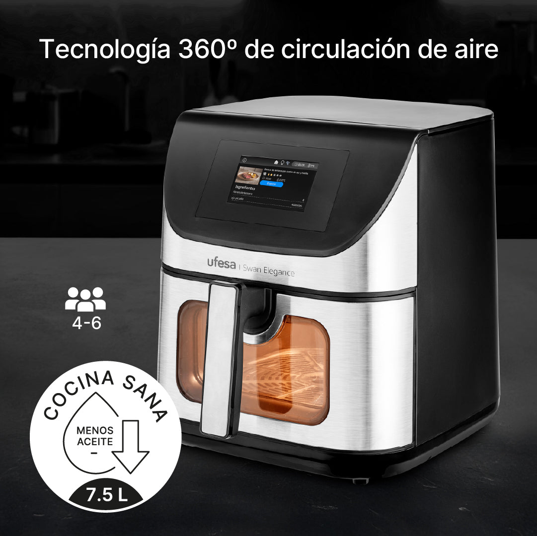 Una freidora de aire con pantalla digital, cámara de cocción transparente y panel de control. Muestra las palabras 'cocina sana' y 'menos aceite'.