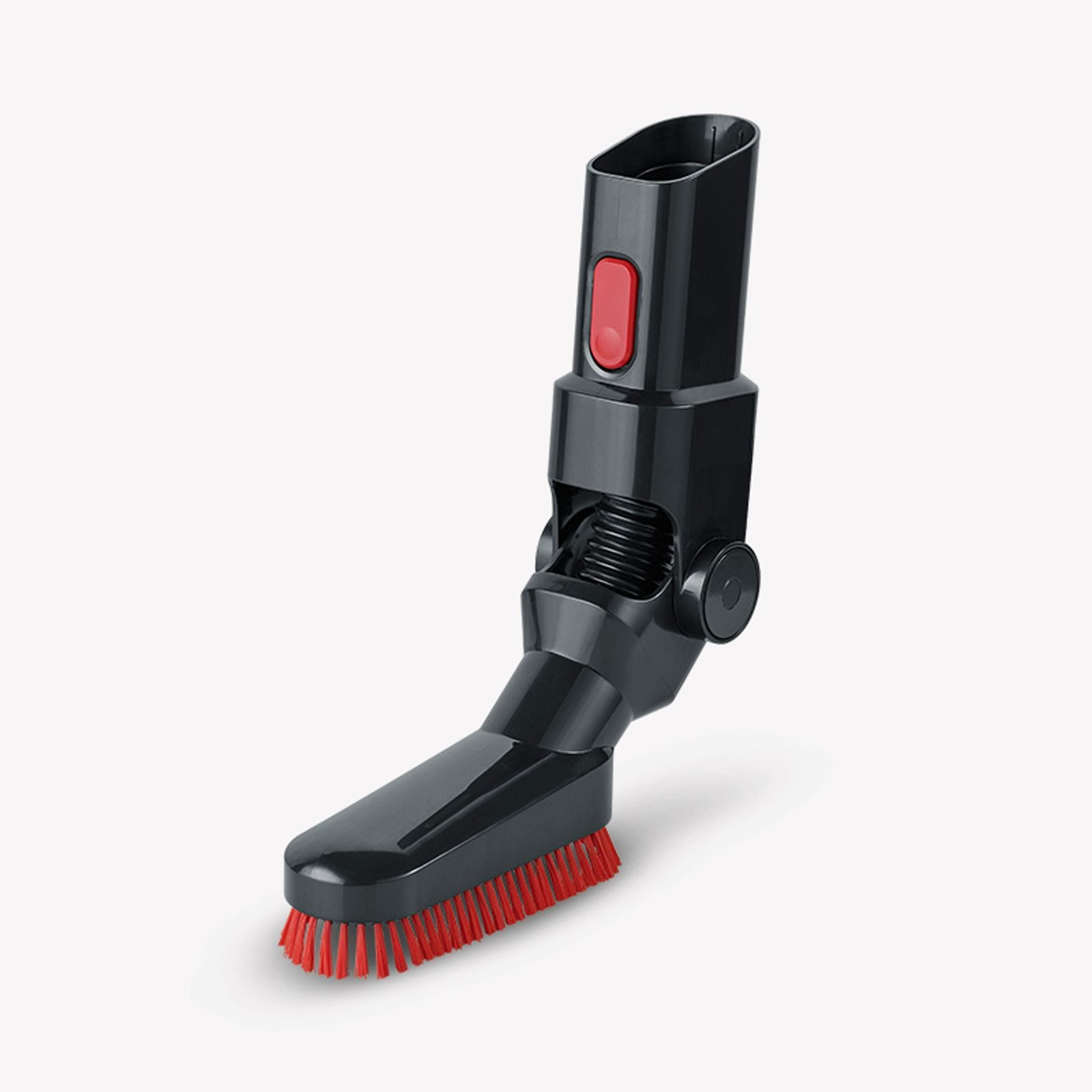 Un accessorio nero per aspirapolvere con un pulsante rosso e setole rosse. È angolato su sfondo bianco.