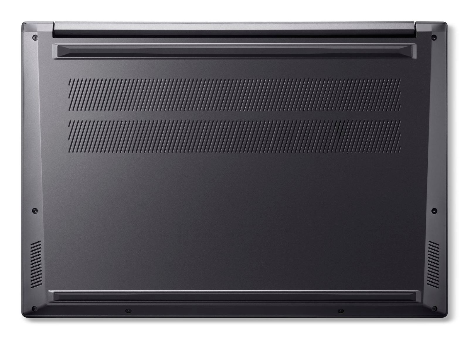 Widok od spodu czarnego laptopa z otworami wentylacyjnymi i ciemną powierzchnią, nowoczesny design.