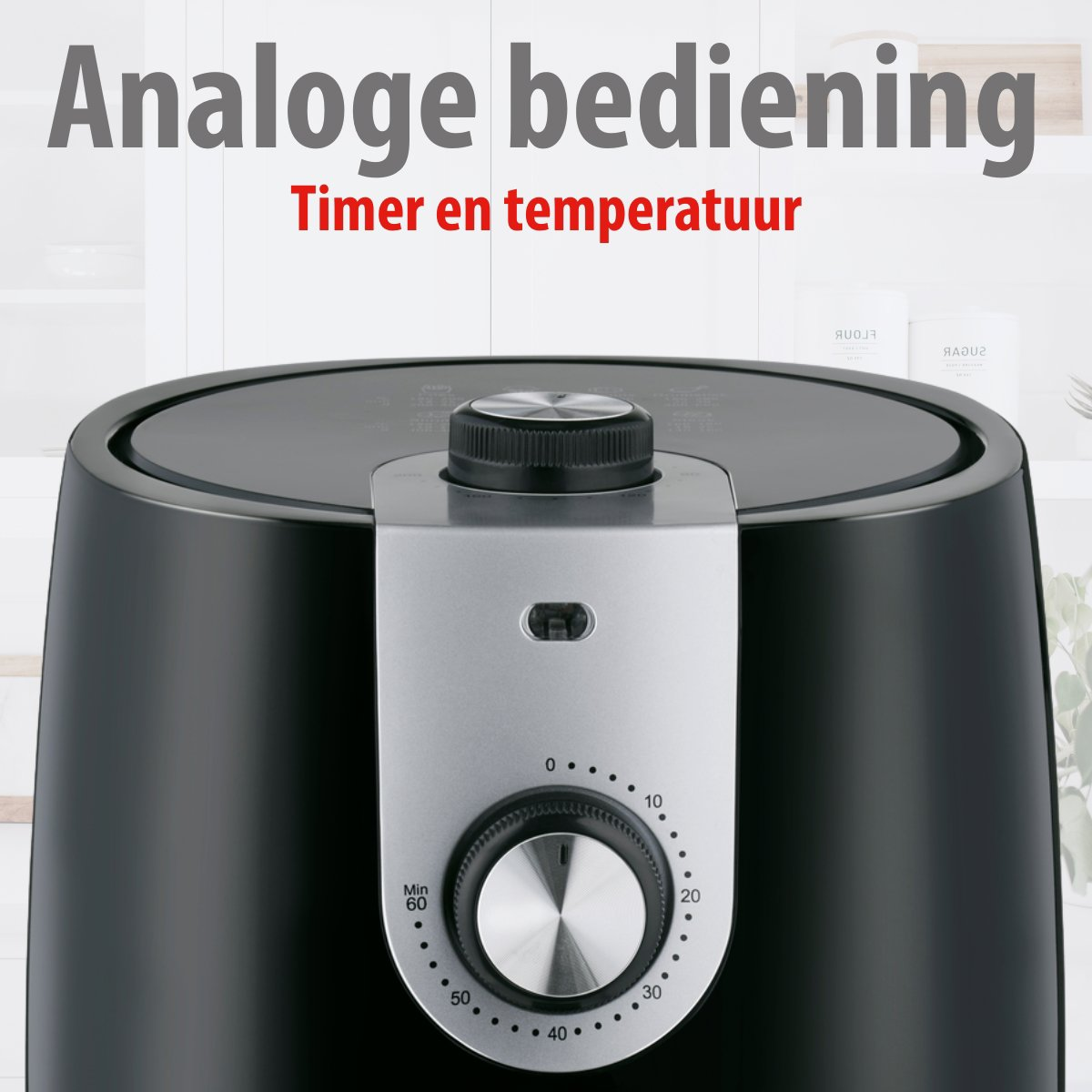 Zwarte airfryer met timer- en temperatuurregelaars. Tekst bovenaan zegt 'Analoge bediening Timer en temperatuur'.
