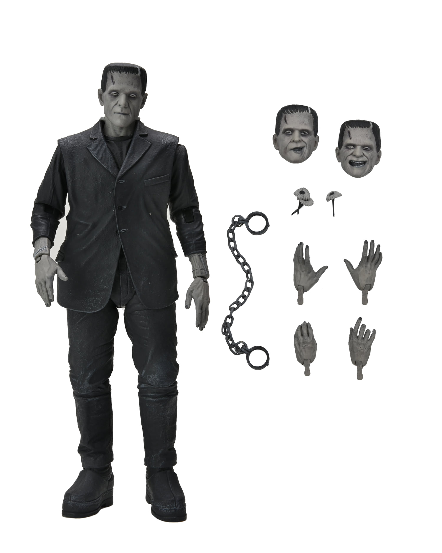 Ekstra kafalar, eller, zincir ve çiçeklerle Frankenstein figürü. Figür gri ve siyahtır, siyah takım elbise ve botlarla.
