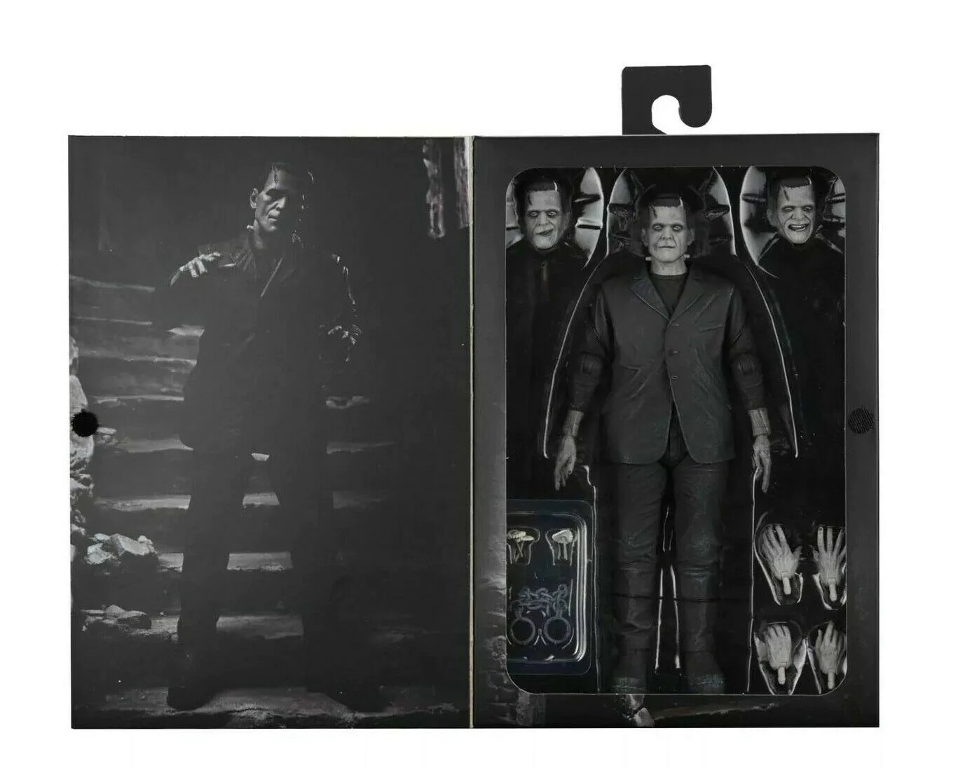 Bir Frankenstein aksiyon figürü bir kutuda. Kutu, Frankenstein'ın görüntüsünü gösteriyor. Kutunun içinde çeşitli aksesuarlar ve ek Frankenstein kafaları var.