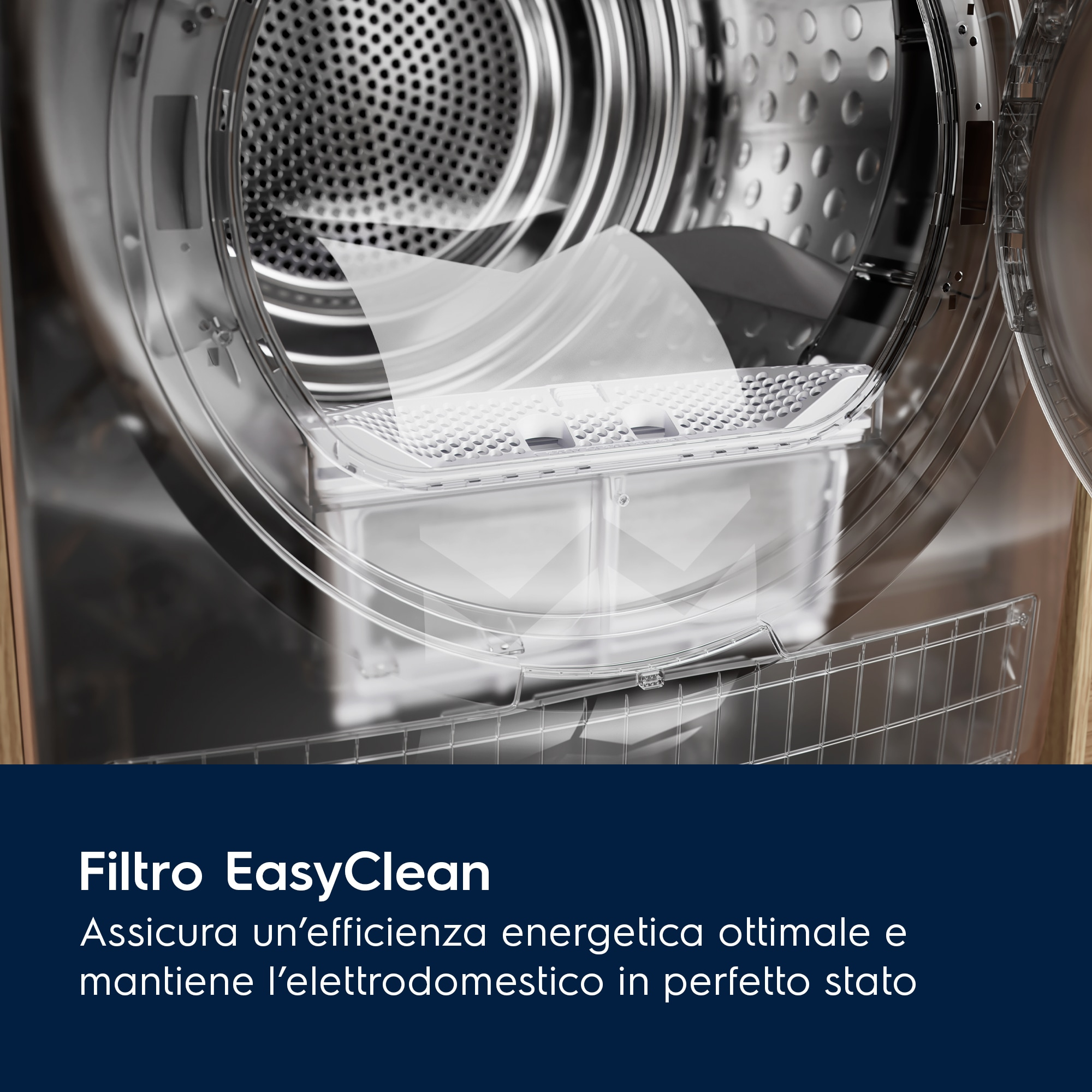 Primer plano del interior de una lavadora, mostrando el filtro EasyClean. El filtro es blanco y está en la parte inferior. La máquina es plateada.