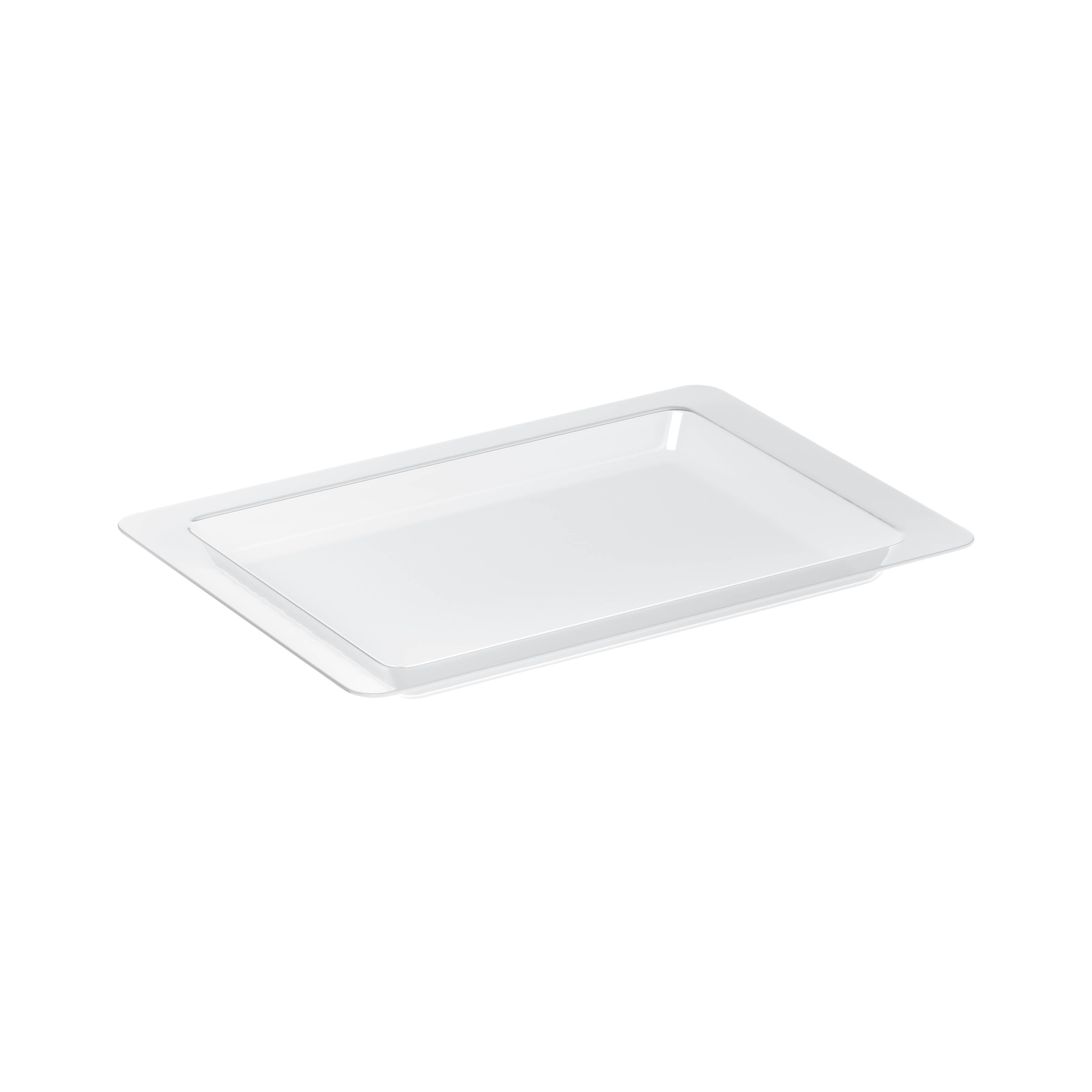 An overhead shot of a white rectangular tray on a white surface. The tray has a slightly raised edge.