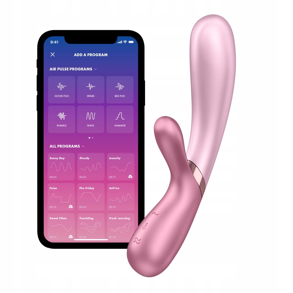 Różowy wibrator obok smartfona wyświetlającego opcje programu. Telefon pokazuje nazwy programów takie jak 'Good Fun' i 'Pulse'.
