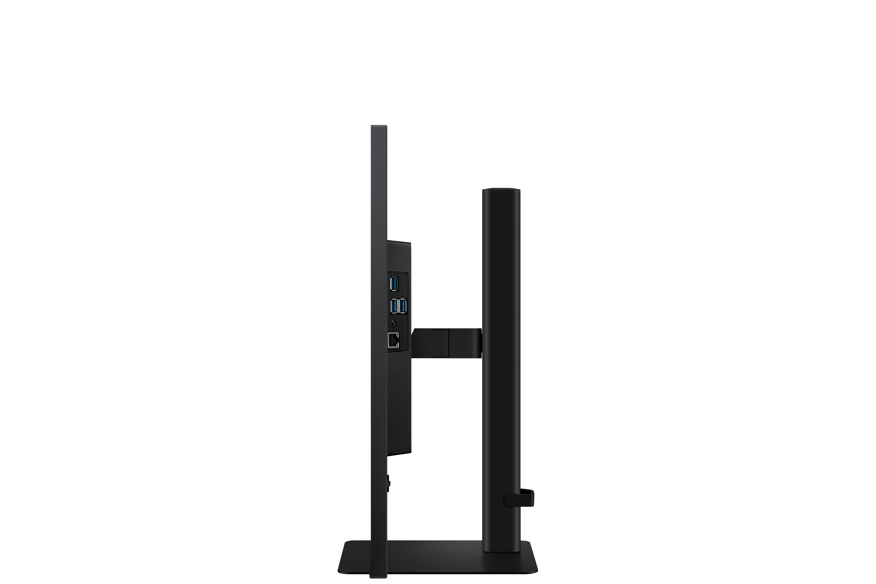 Czarny monitor komputera w profilu. Ma podstawkę i widoczne porty. Tło jest białe.