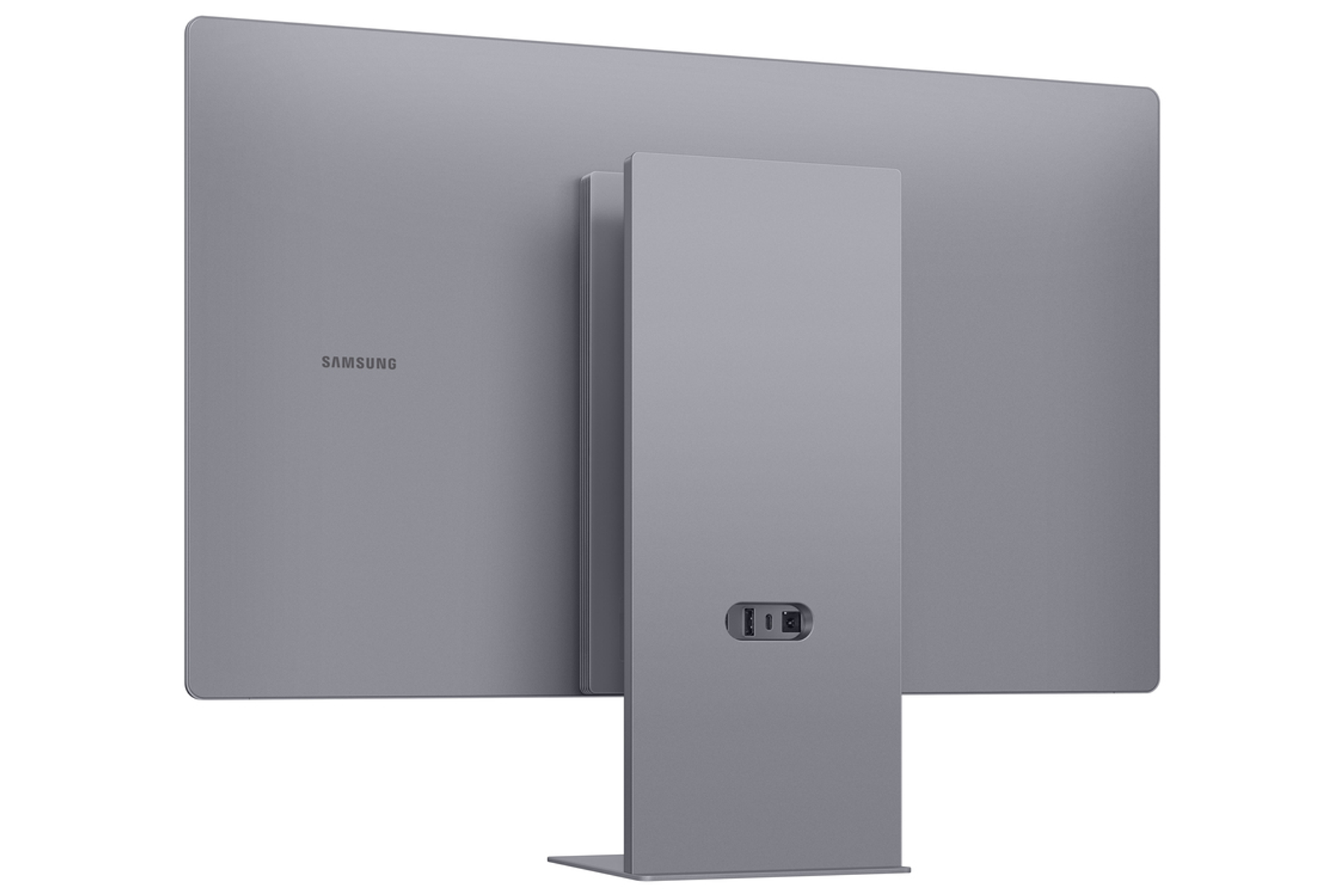 Parte trasera de un monitor gris Samsung. Tiene un soporte y puertos. El logotipo de Samsung es visible.