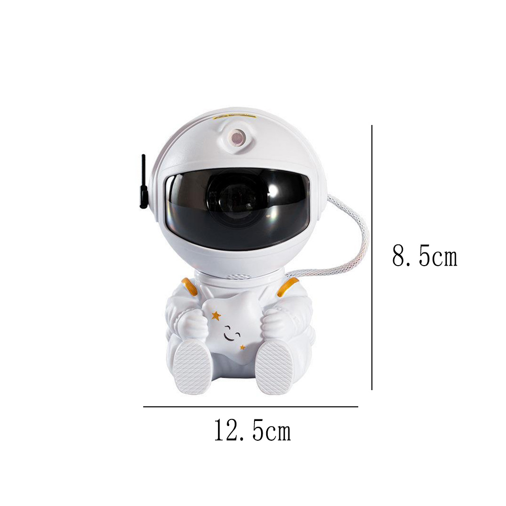 Eine weiße Astronautenlampe mit einem Stern. Maße: 12,5 cm breit und 8,5 cm hoch. Sie hat ein schwarzes Visier.
