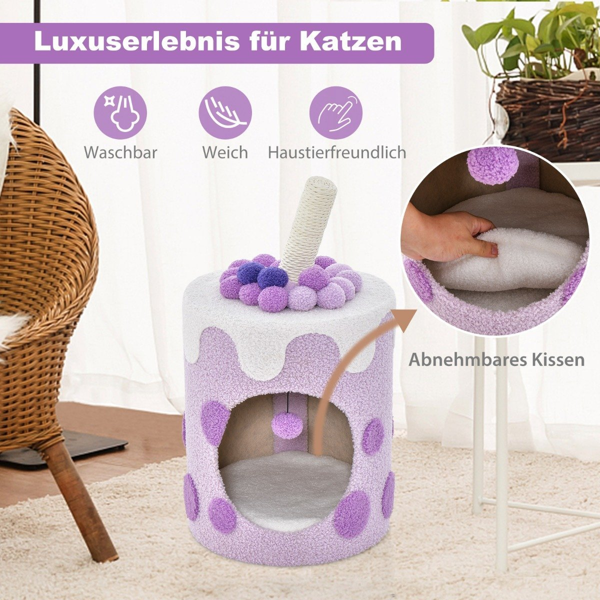 Una cama morada para gatos con una parte superior blanca, que se asemeja a un pastel, con un rascador y un cojín extraíble en el interior. Una mano toca el cojín.