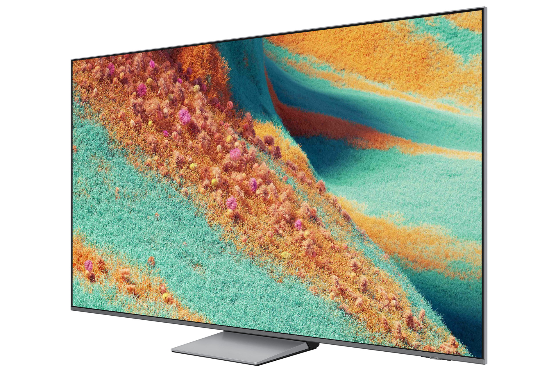 Ein großer Fernseher zeigt eine abstrakte Landschaft. Farben sind Orange, Grün und Rosa, mit einem silbernen Ständer.