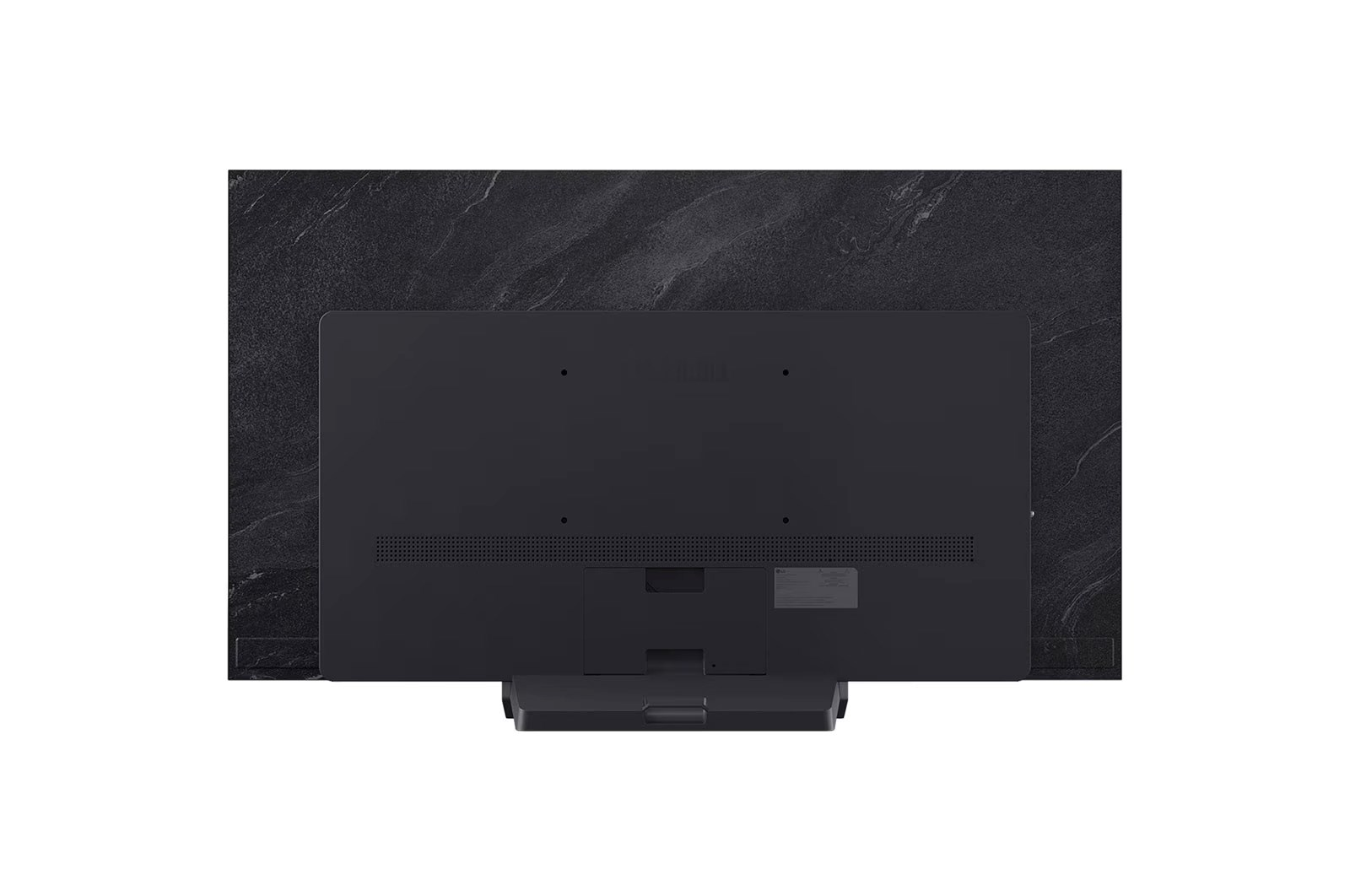 Tył czarnego telewizora na teksturowanej, ciemnej powierzchni. Zawiera porty, podstawę i etykietę. Białe tło.