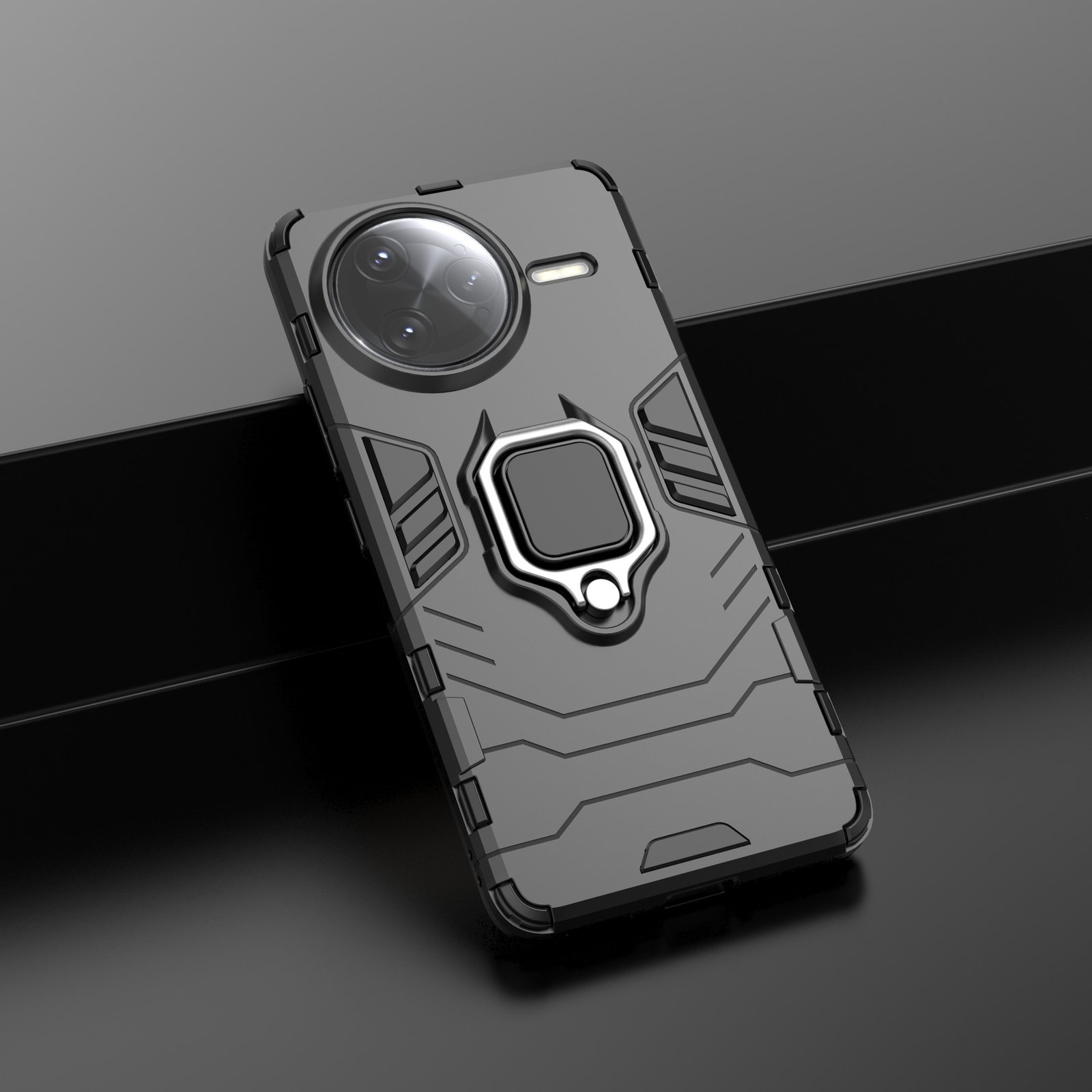 Funda gris para teléfono con recorte para cámara, soporte de anillo plateado y diseño geométrico sobre fondo oscuro.