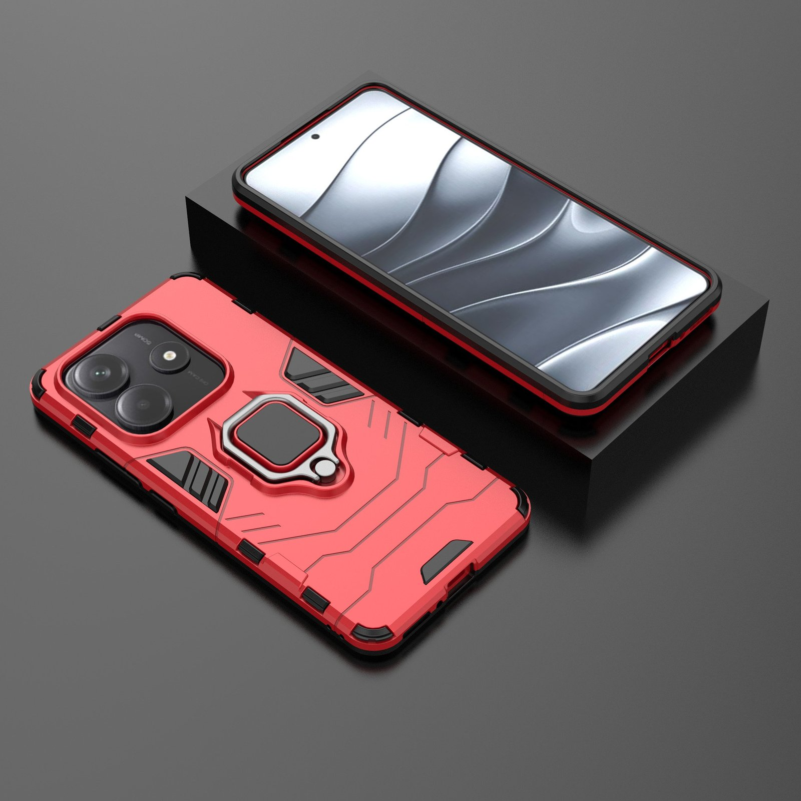 Dos smartphones con fundas rojas sobre una superficie negra. Un teléfono está sobre un soporte negro.
