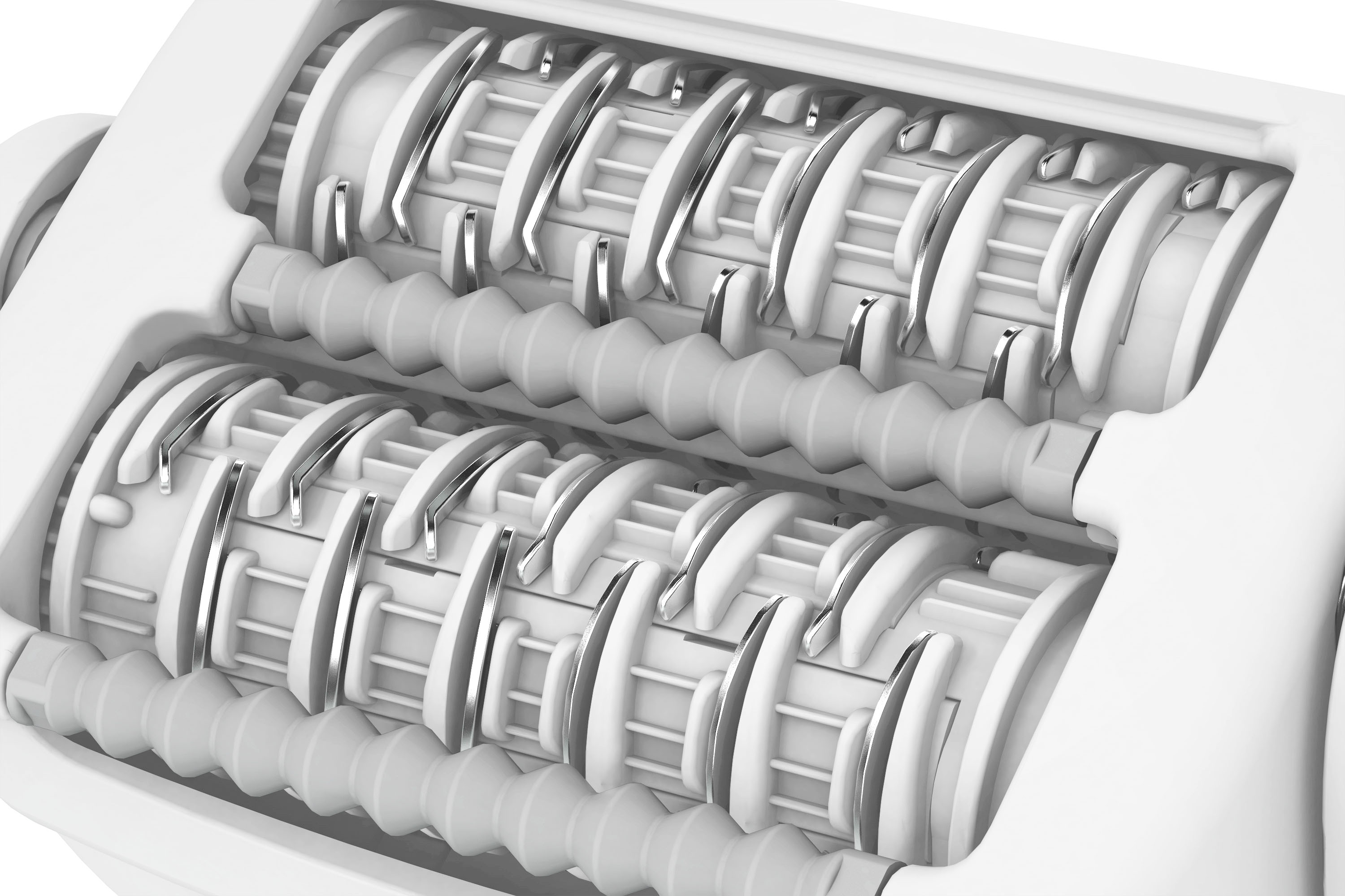 Zbliżenie białego urządzenia kuchennego z wieloma ostrzami i wałkami, prawdopodobnie do robienia makaronu.