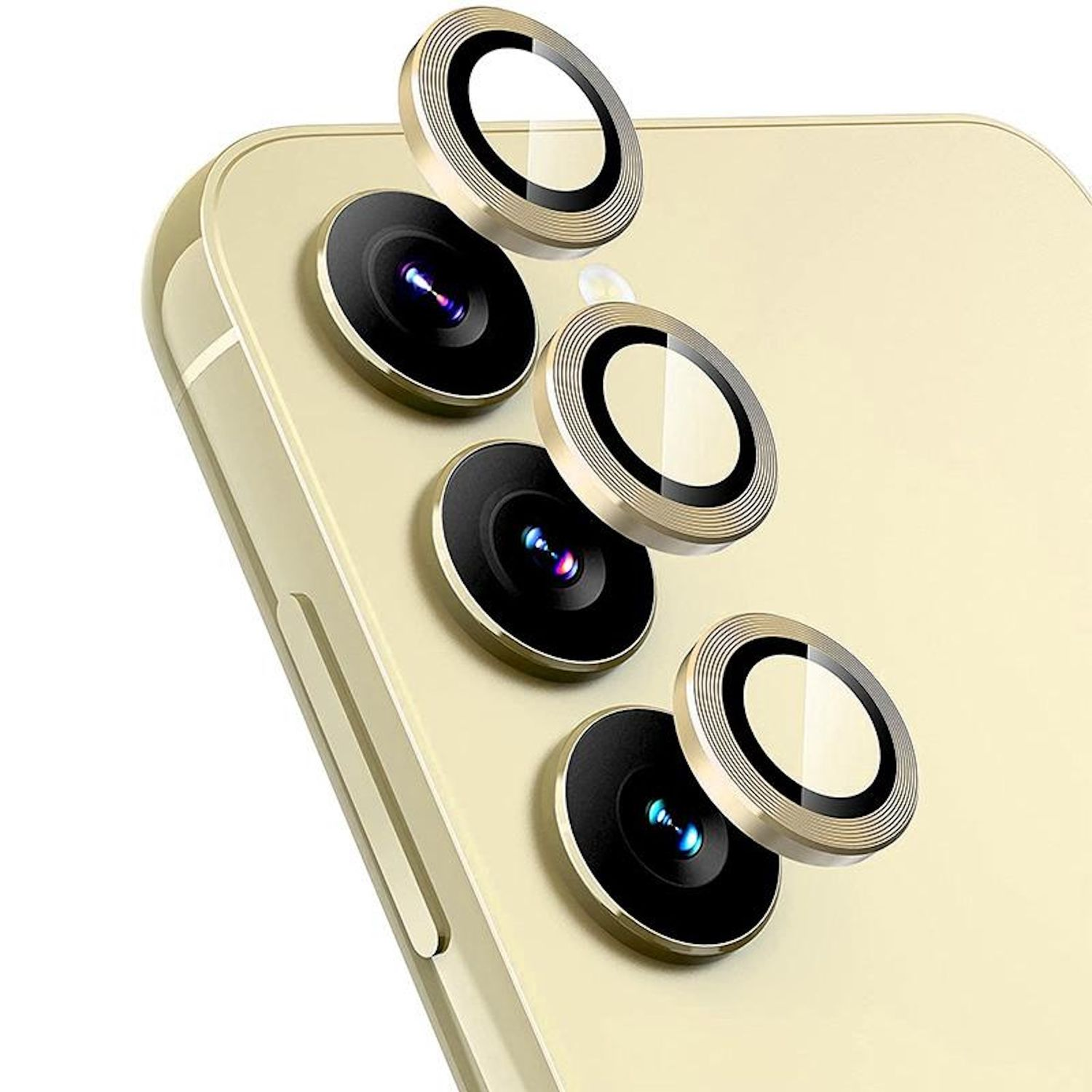 Primo piano di un telefono dorato con protezioni per lenti della fotocamera. Le protezioni sono dorate con cerchi neri e coprono le lenti della fotocamera del telefono.
