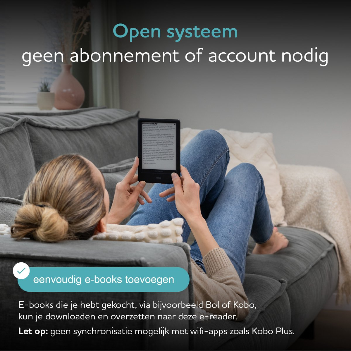 A woman reads an e-reader while reclining on a gray sofa. Text at the top promotes 'open system'.