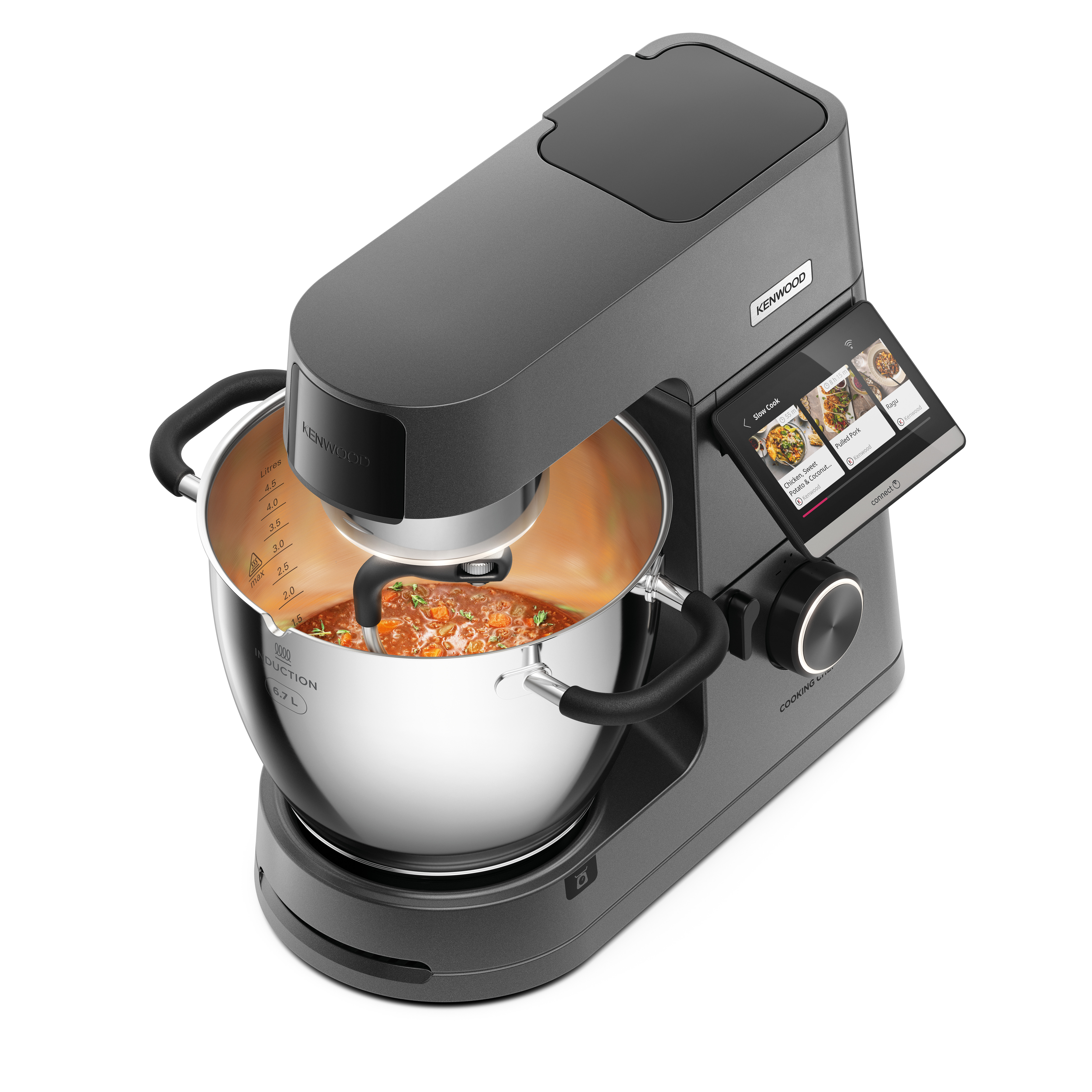 Graues Kenwood Cooking Chef Küchengerät. Eine Schüssel enthält Essen. Ein Bildschirm zeigt Kochoptionen an.