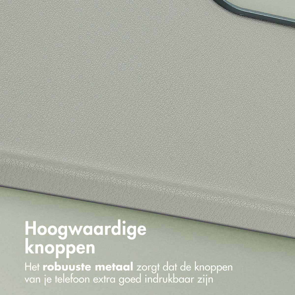 Close-up van een grijs oppervlak met een licht getextureerde uitstraling. De randen zijn afgerond. Tekst in het Nederlands onderaan.