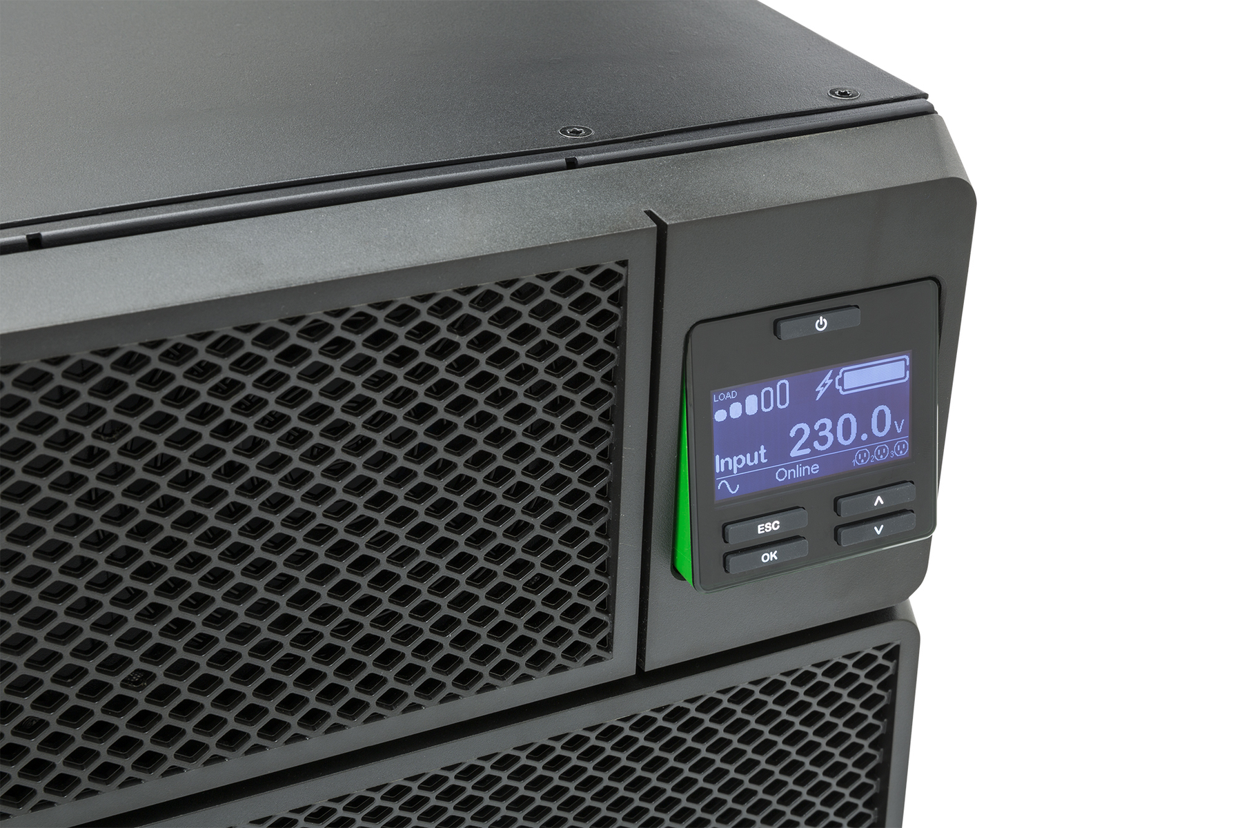 Dispositivo UPS nero con display digitale. Il display mostra la tensione di ingresso, lo stato e il livello della batteria. Una luce verde è accesa.