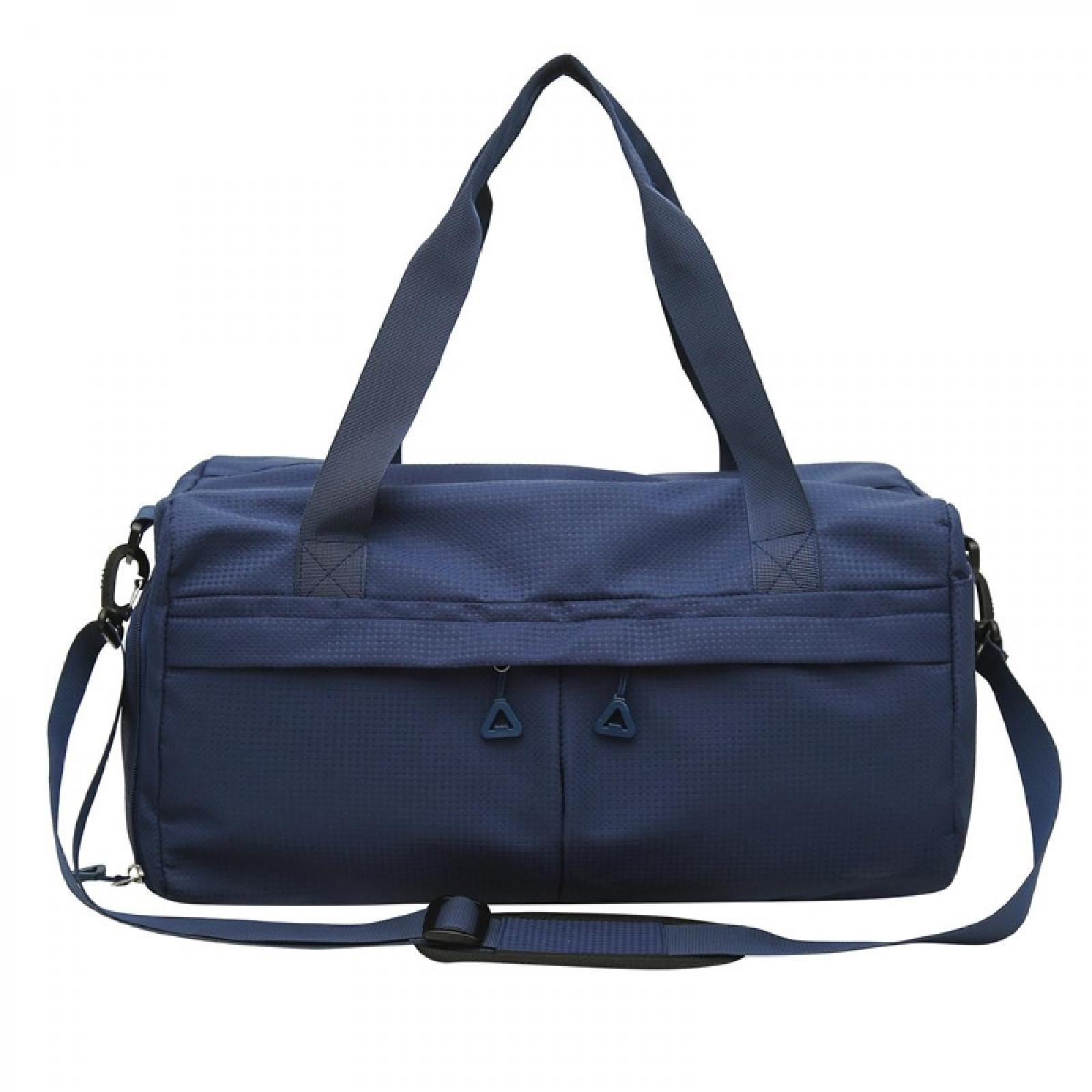 Eine marineblaue Reisetasche mit zwei Griffen und einem Schultergurt. Sie hat zwei Vordertaschen mit dreieckigen Reißverschlüssen.