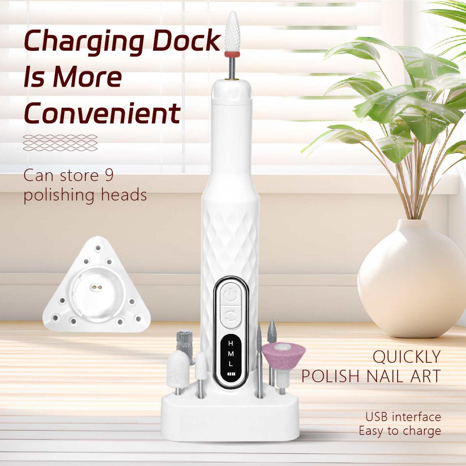 Ein weißer Nagelbohrer mit mehreren Bits auf einer weißen Basis. Der Text lautet 'Charging Dock Is More Convenient' und 'Quickly Polish Nail Art'.